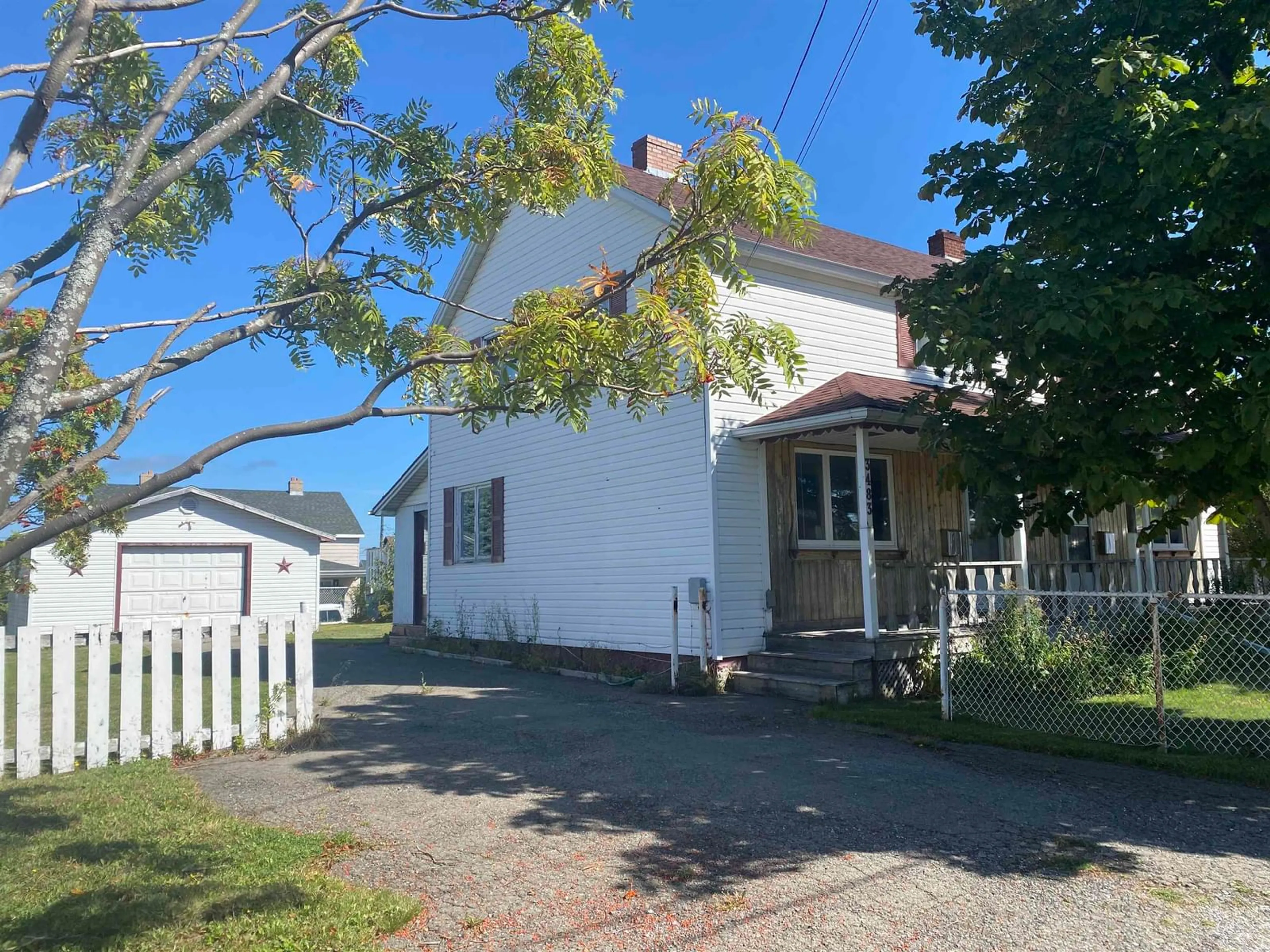 A pic from outside/outdoor area/front of a property/back of a property/a pic from drone, street for 3483 Wood Ave, New Waterford Nova Scotia B1H 1V4