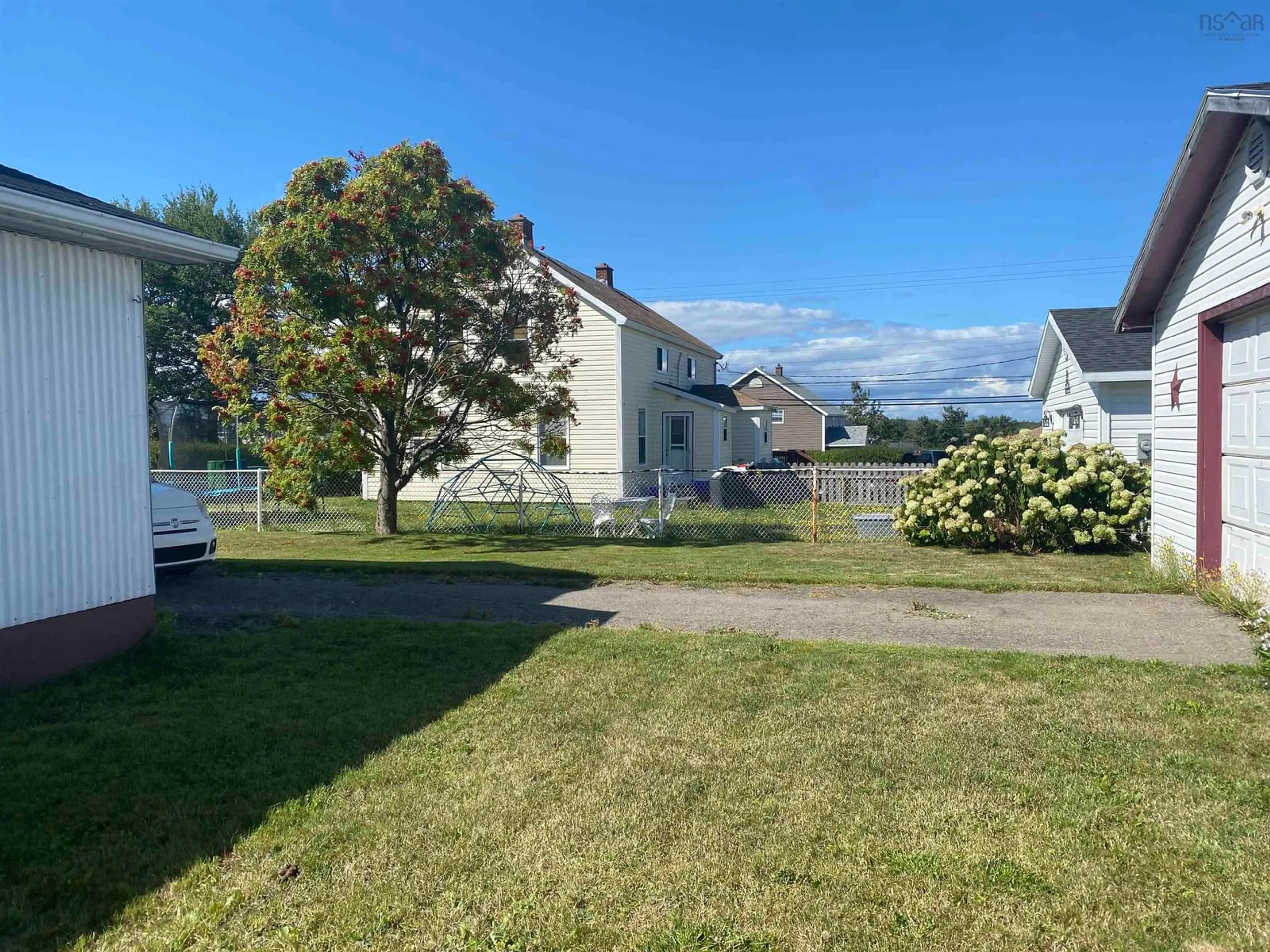 A pic from outside/outdoor area/front of a property/back of a property/a pic from drone, street for 3483 Wood Ave, New Waterford Nova Scotia B1H 1V4