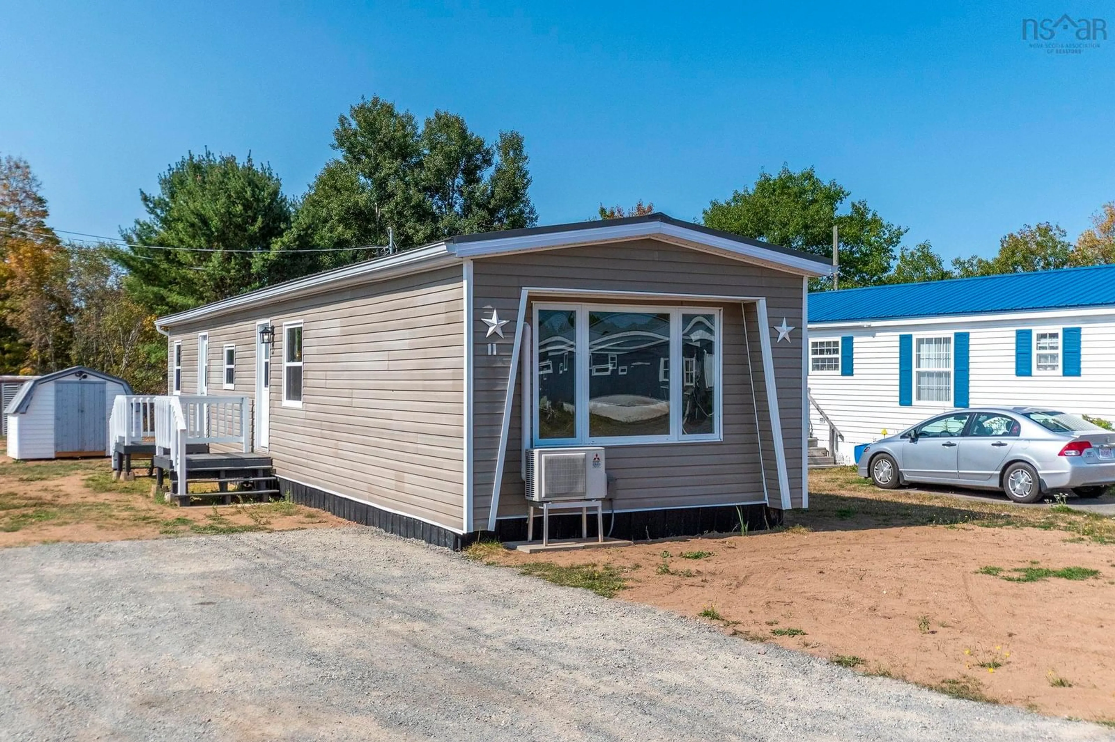 Home with vinyl exterior material, street for 11 Beattie Drive, Windermere Nova Scotia B0P 1E0