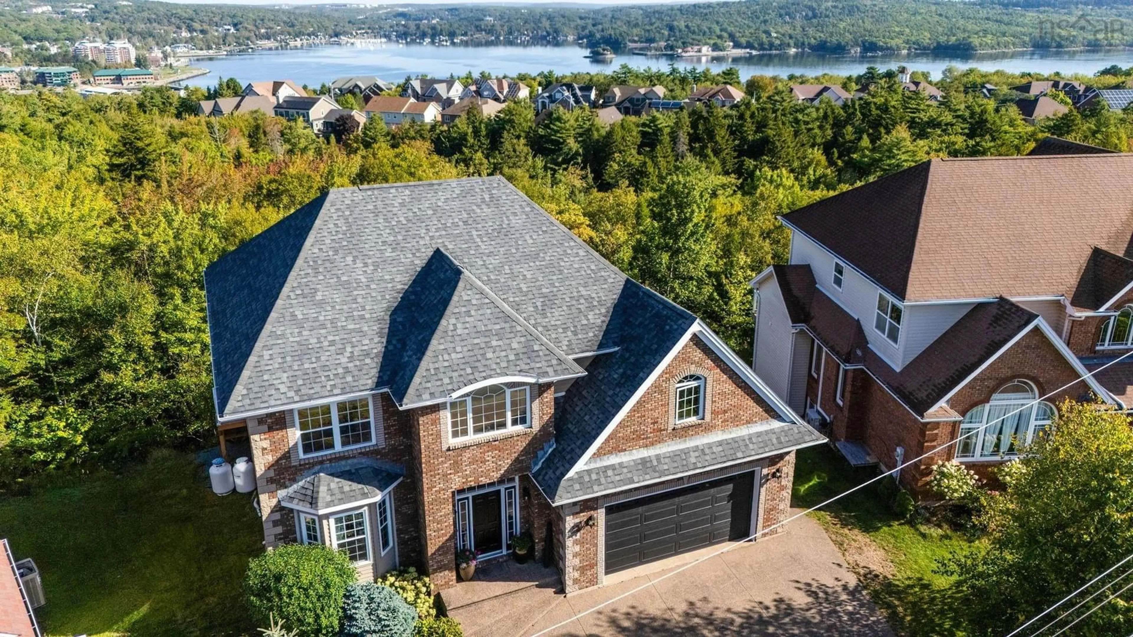 A pic from outside/outdoor area/front of a property/back of a property/a pic from drone, water/lake/river/ocean view for 16 Vanier Way, Halifax Nova Scotia B4A 0A4
