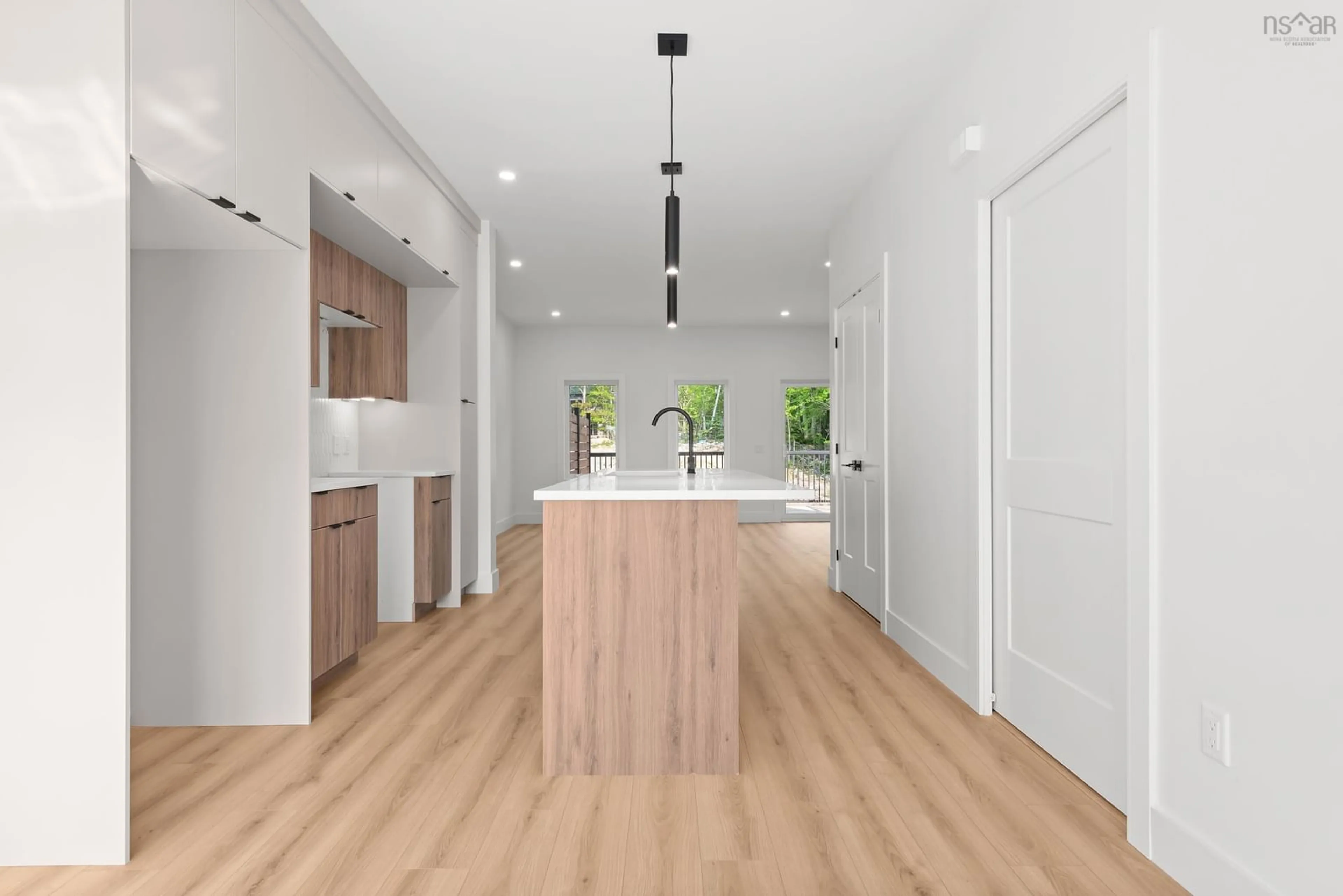 Open concept kitchen, wood/laminate floor for 130 Colonial Cres, Halifax Nova Scotia B3R 0H8