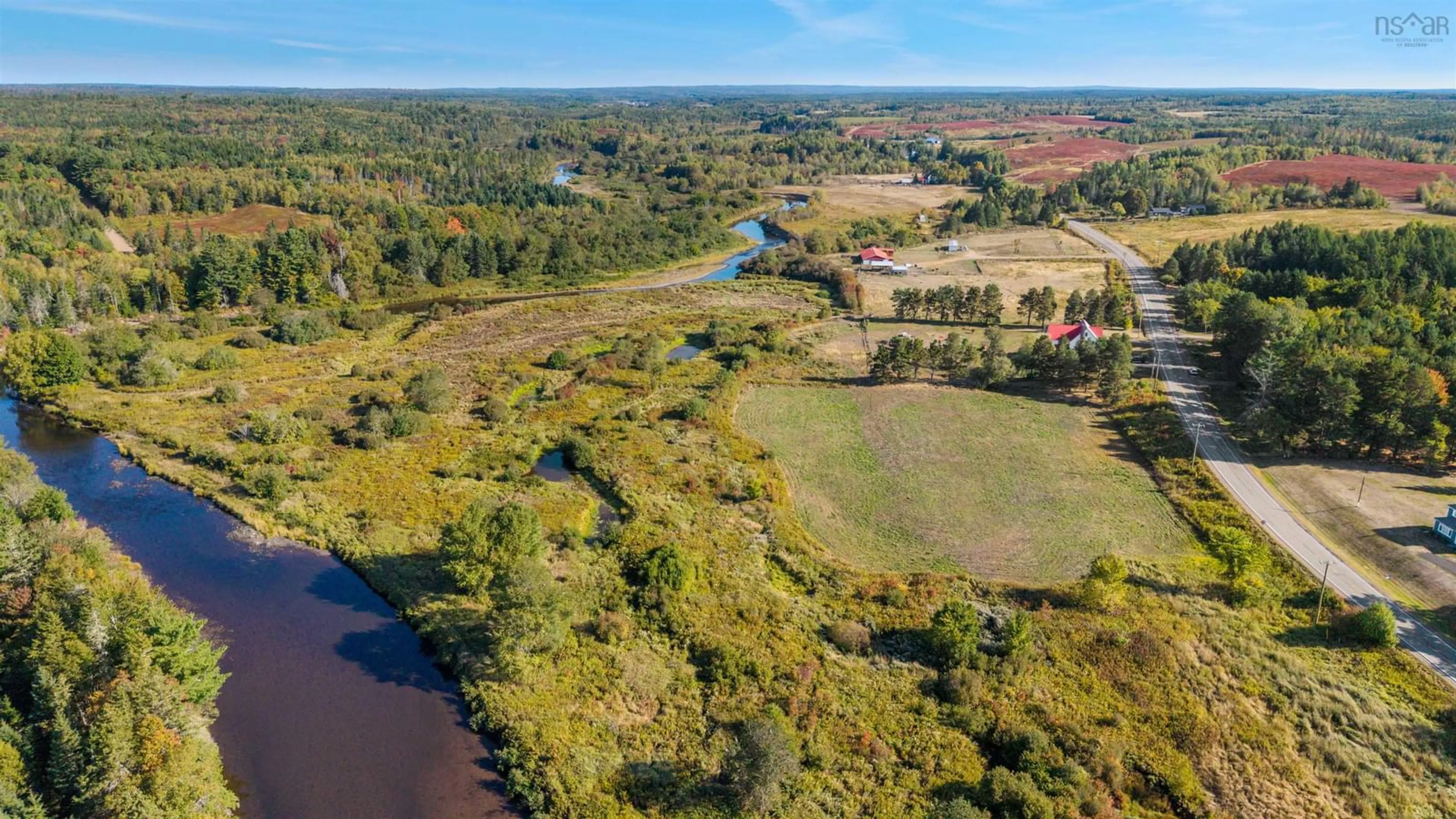A pic from outside/outdoor area/front of a property/back of a property/a pic from drone, water/lake/river/ocean view for 187 Highway 302, Southampton Nova Scotia B0M 1W0