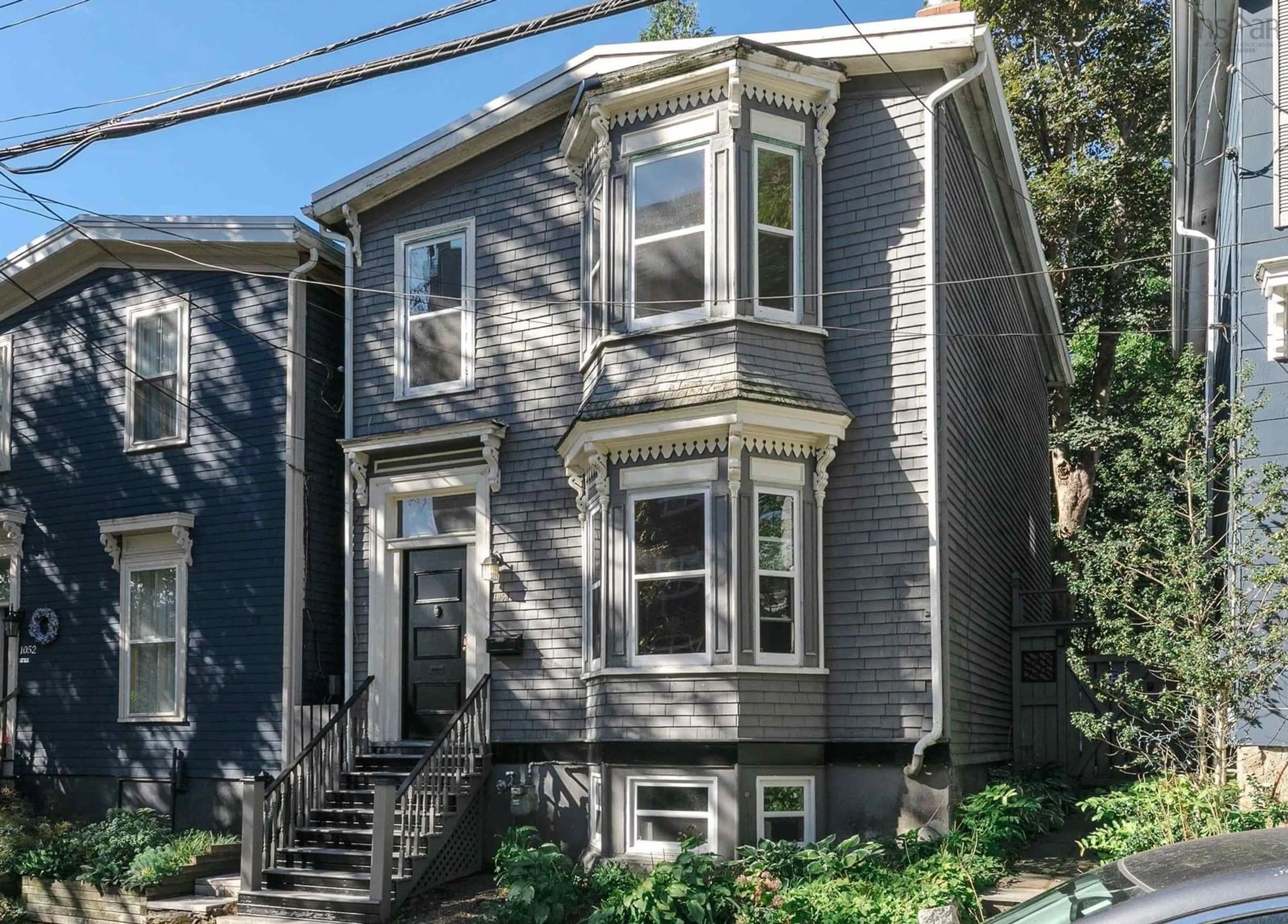 Home with vinyl exterior material, street for 1056 Lucknow St, Halifax Nova Scotia B3H 2T5