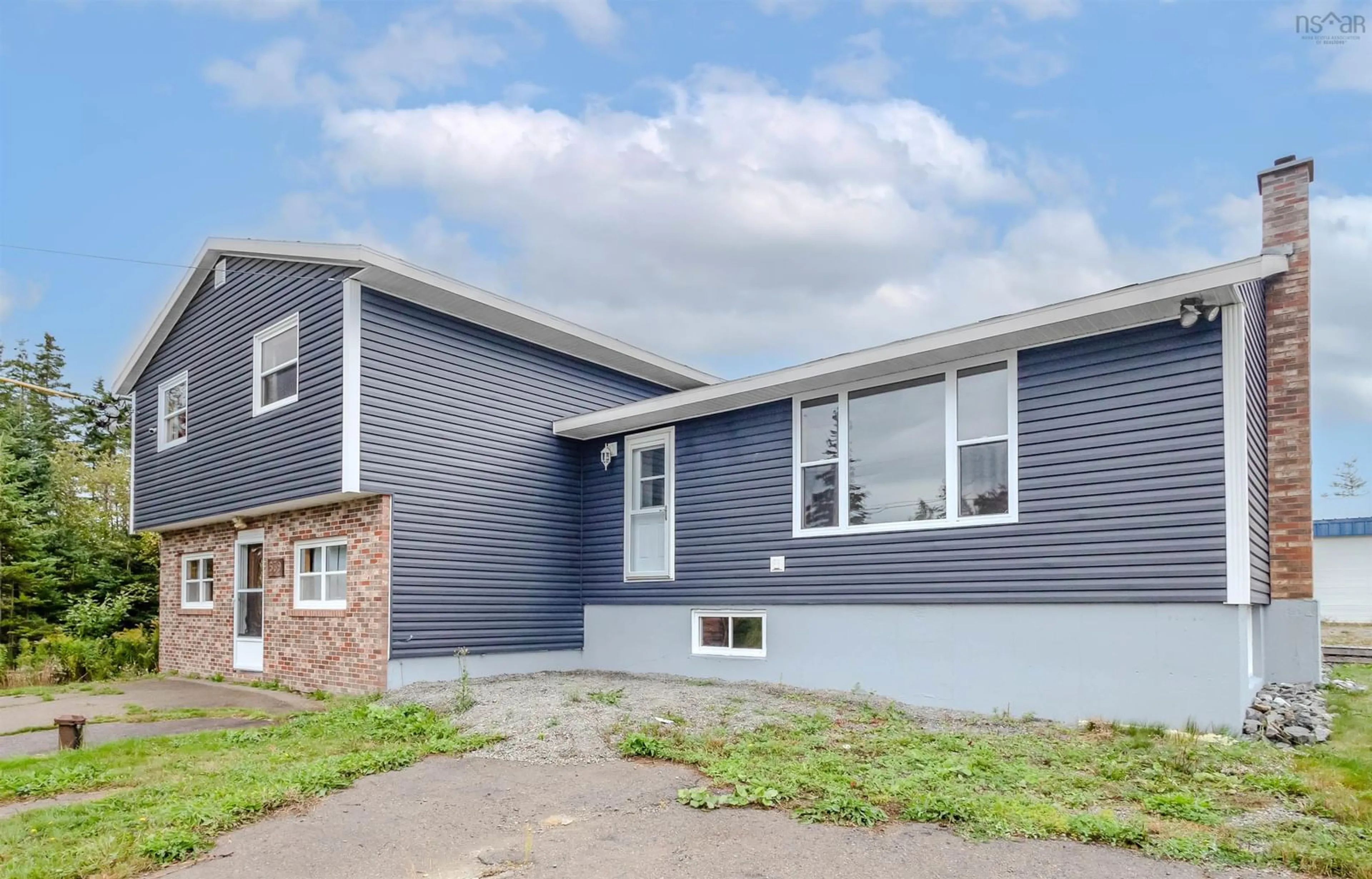 Home with vinyl exterior material, street for 1541 Gabarus Hwy, Prime Brook Nova Scotia B1L 1E7