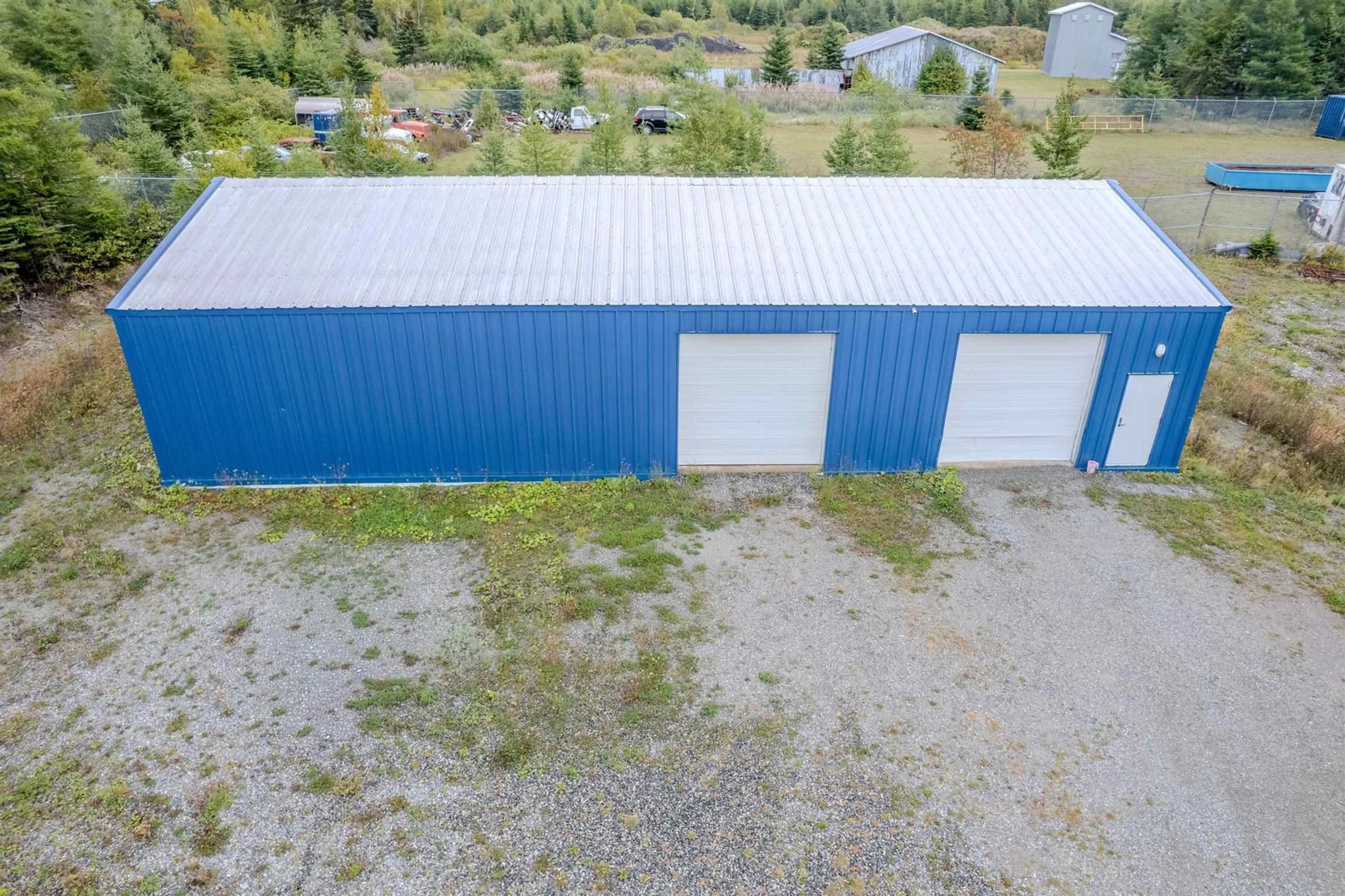 A pic from outside/outdoor area/front of a property/back of a property/a pic from drone, building for 1541 Gabarus Hwy, Prime Brook Nova Scotia B1L 1E7