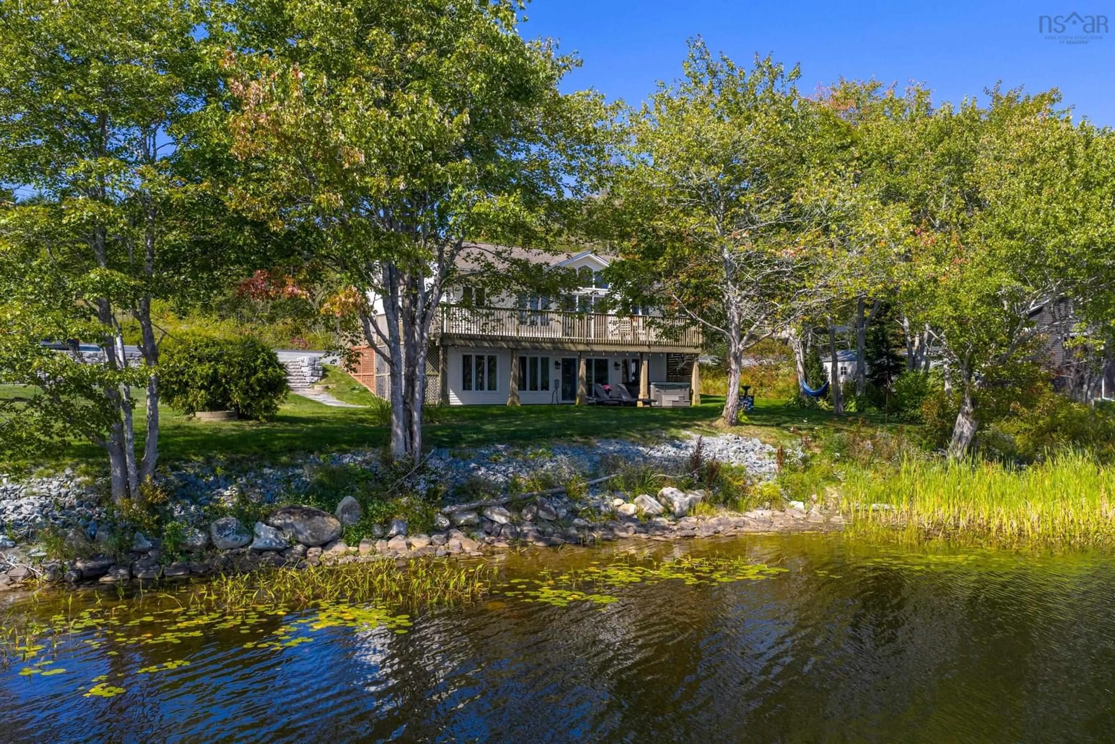 A pic from outside/outdoor area/front of a property/back of a property/a pic from drone, water/lake/river/ocean view for 557 East Uniacke Rd, East Uniacke Nova Scotia B0N 1Z0