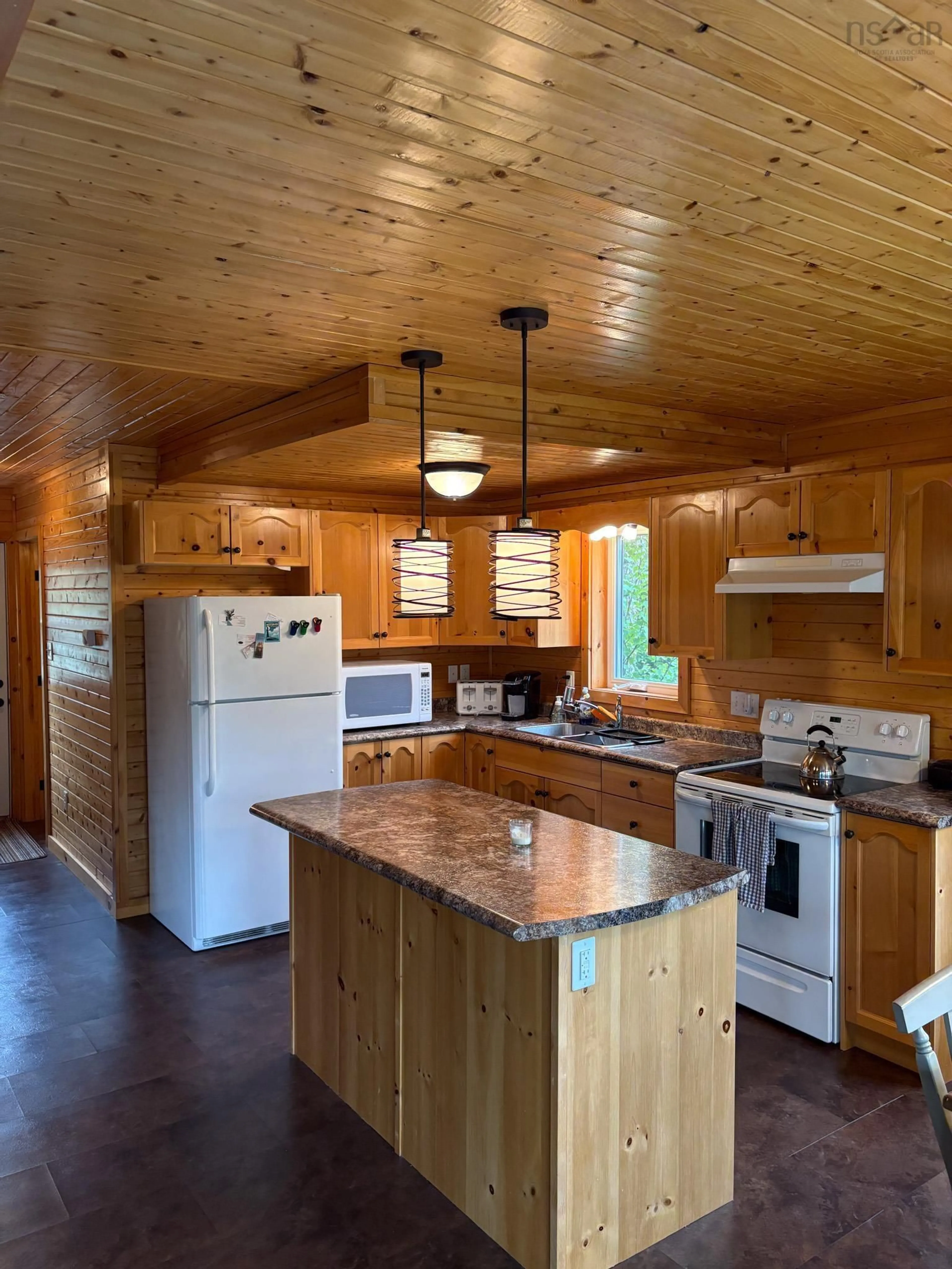 Open concept kitchen, wood/laminate floor for 274 Heritage Way #38, East Uniacke Nova Scotia B0N 1Z0