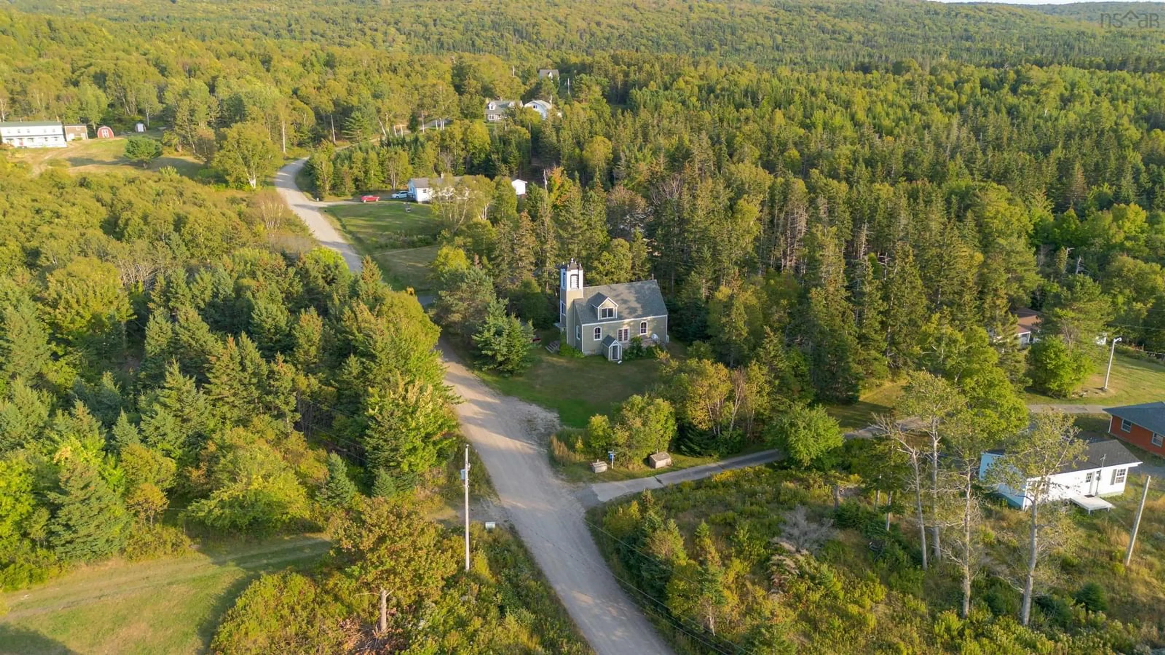 A pic from outside/outdoor area/front of a property/back of a property/a pic from drone, unknown for 18 Kellys Lane, Englishtown Nova Scotia B0C 1H0