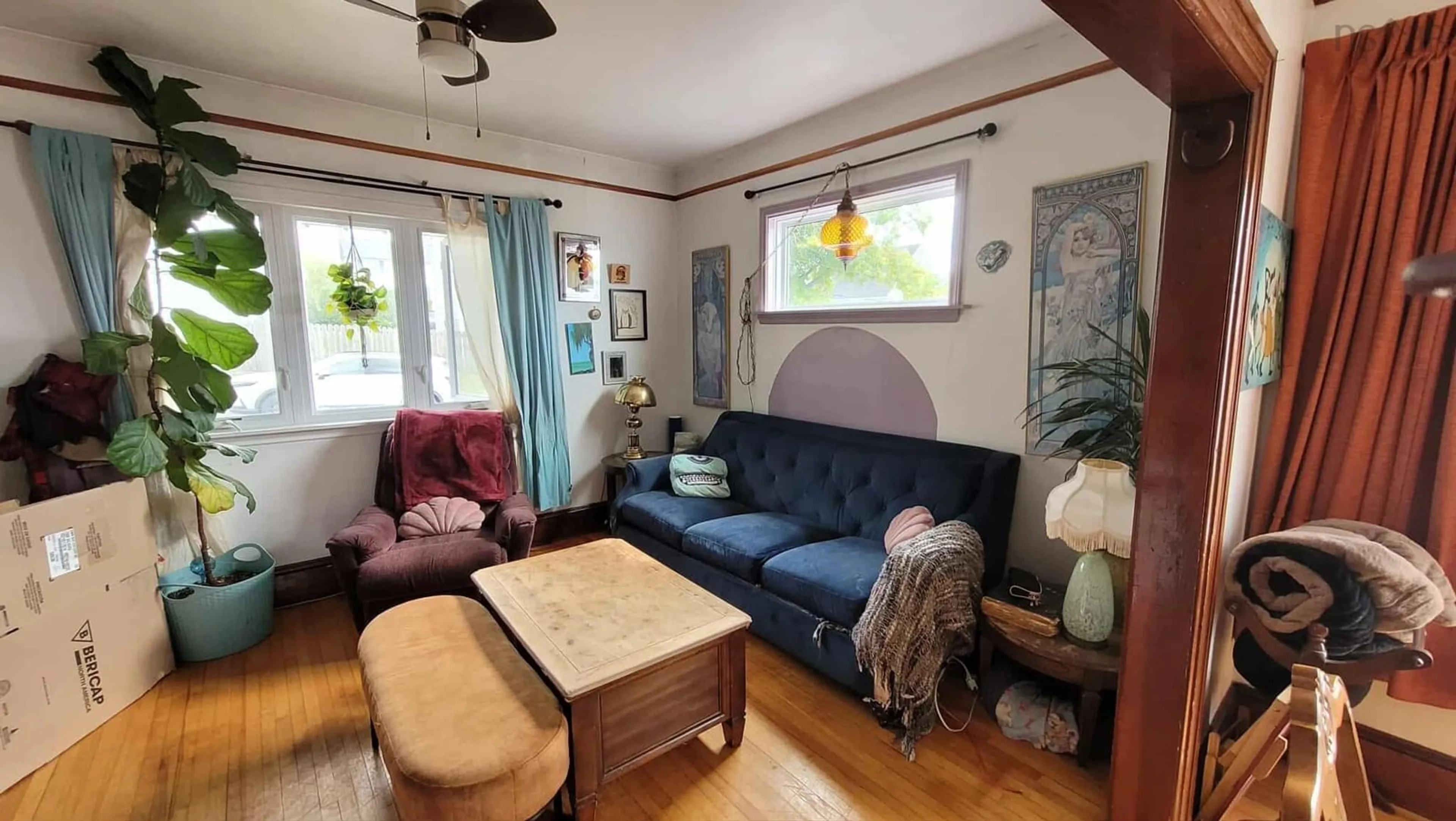 Living room with furniture, unknown for 53 East St, Sydney Nova Scotia B1N 1S7