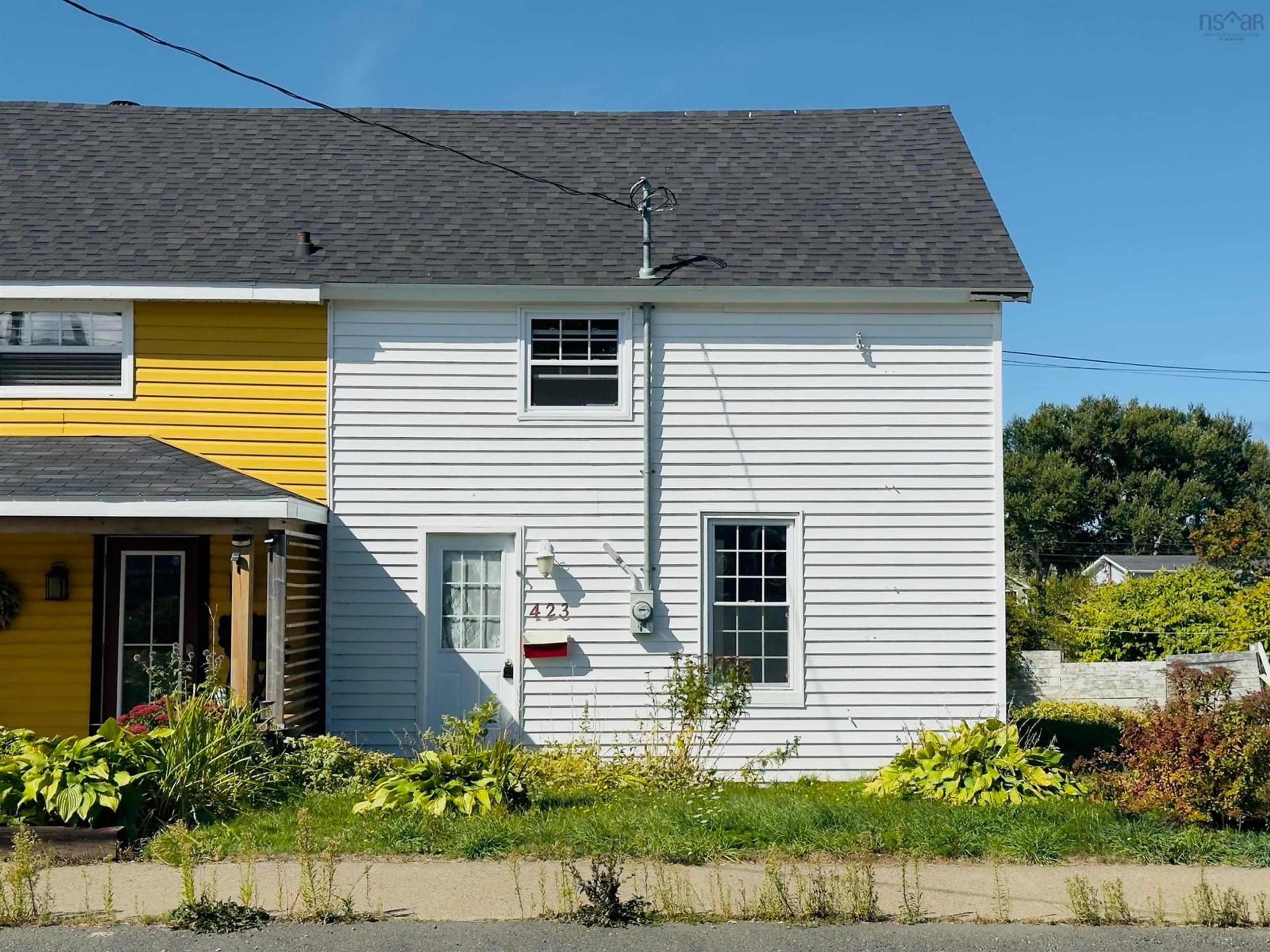 Home with vinyl exterior material, street for 423 King Street, New Waterford Nova Scotia B1H 3Y5