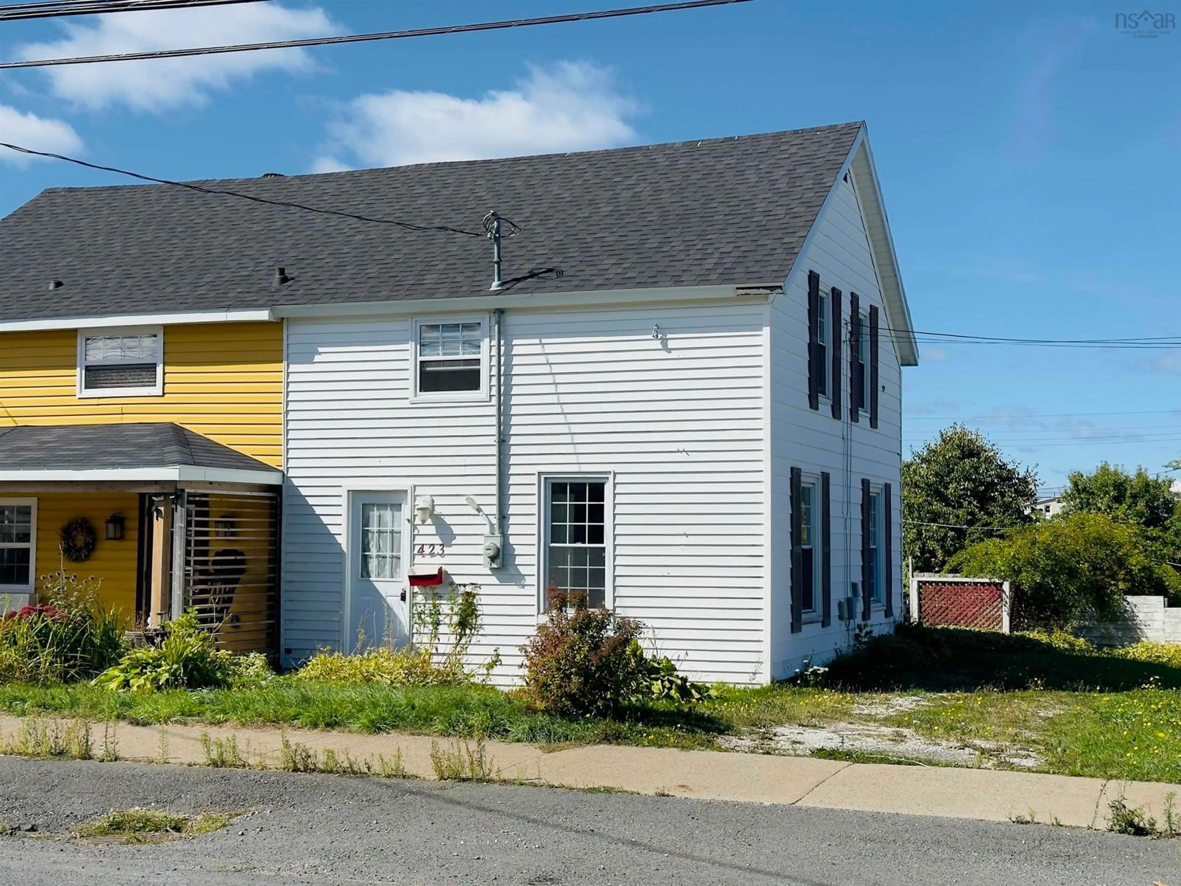 A pic from outside/outdoor area/front of a property/back of a property/a pic from drone, street for 423 King Street, New Waterford Nova Scotia B1H 3Y5