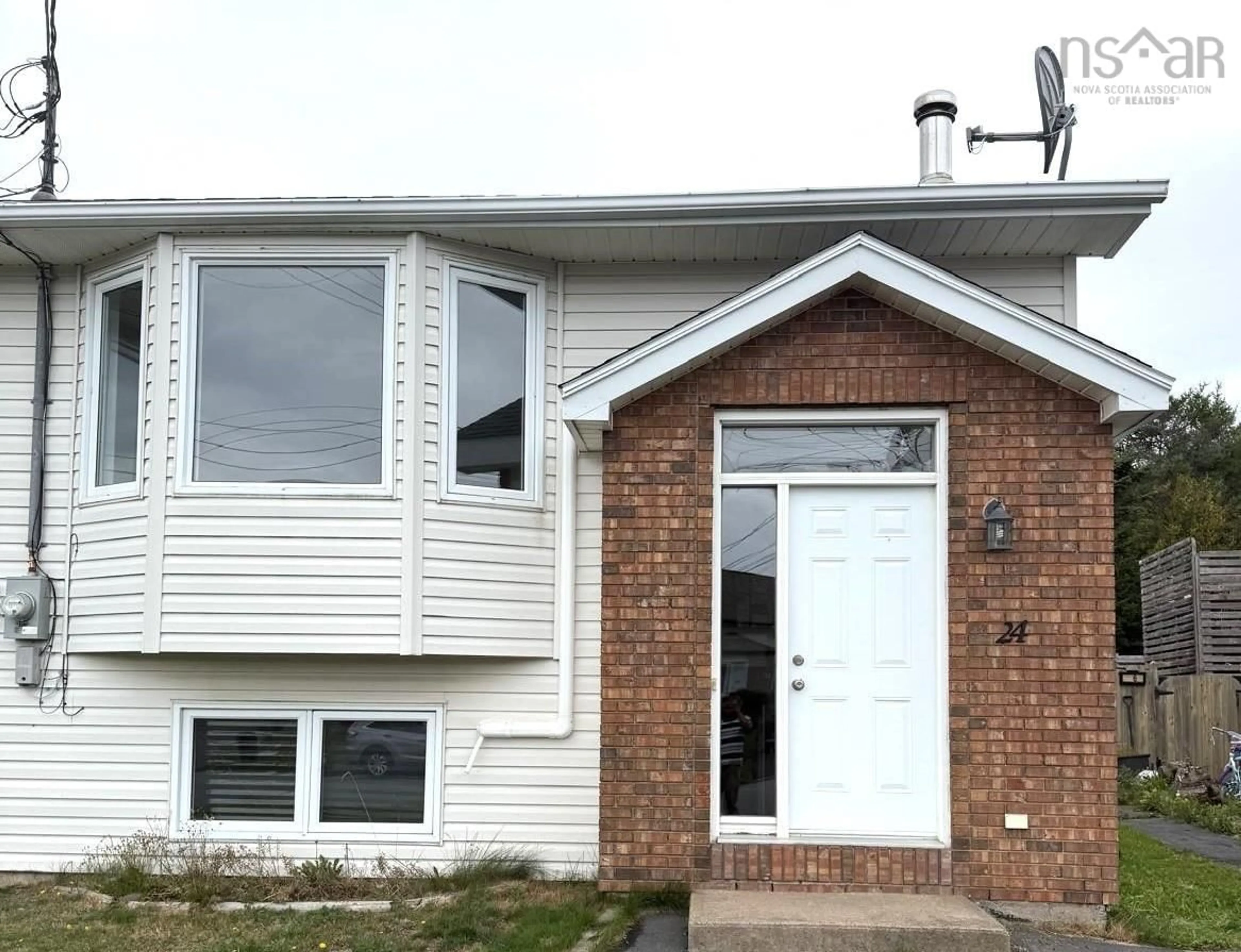 Home with vinyl exterior material, street for 24 Chater St, Eastern Passage Nova Scotia B3G 1N7