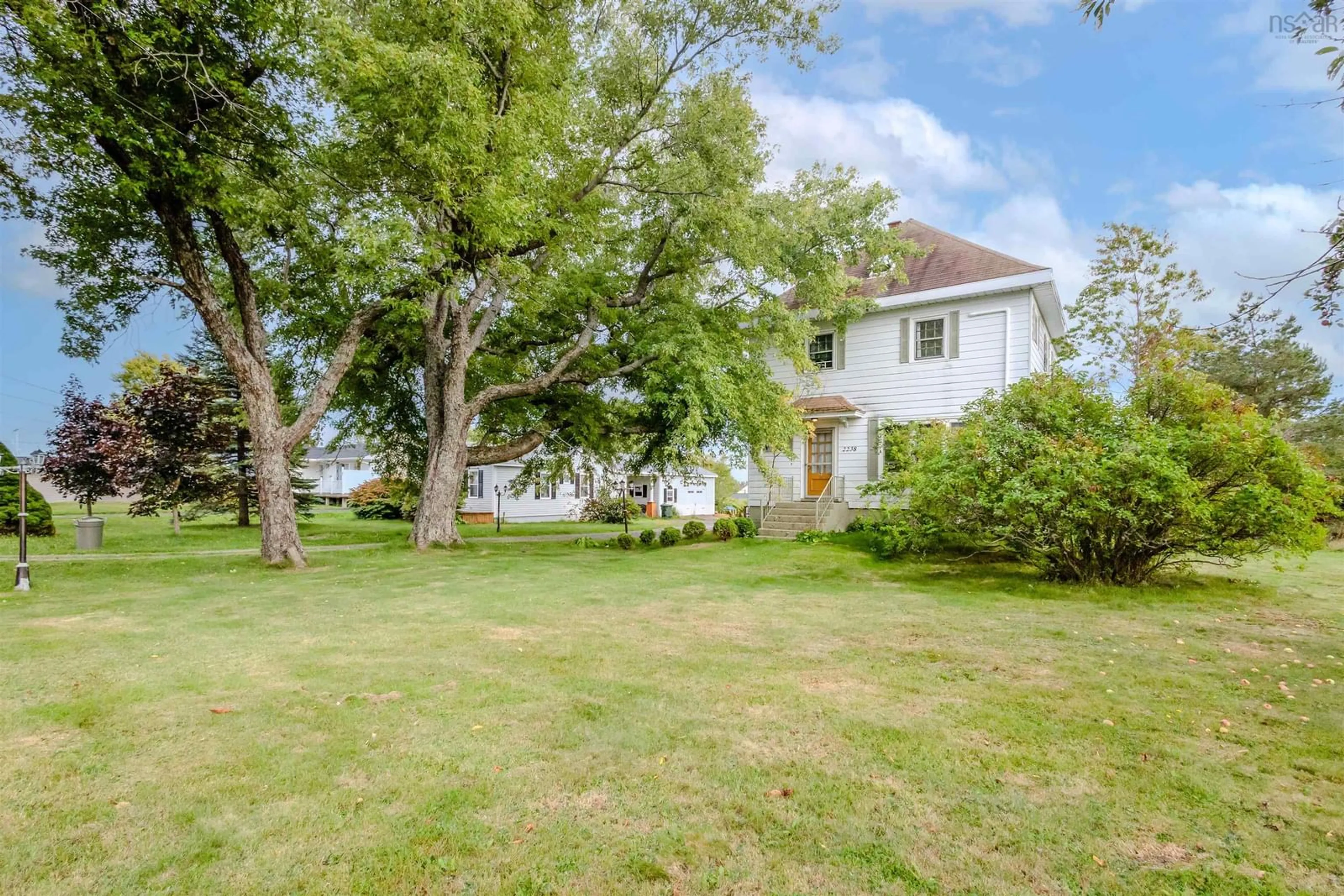 A pic from outside/outdoor area/front of a property/back of a property/a pic from drone, unknown for 2238 Sydney Rd, Reserve Mines Nova Scotia B1E 1K1