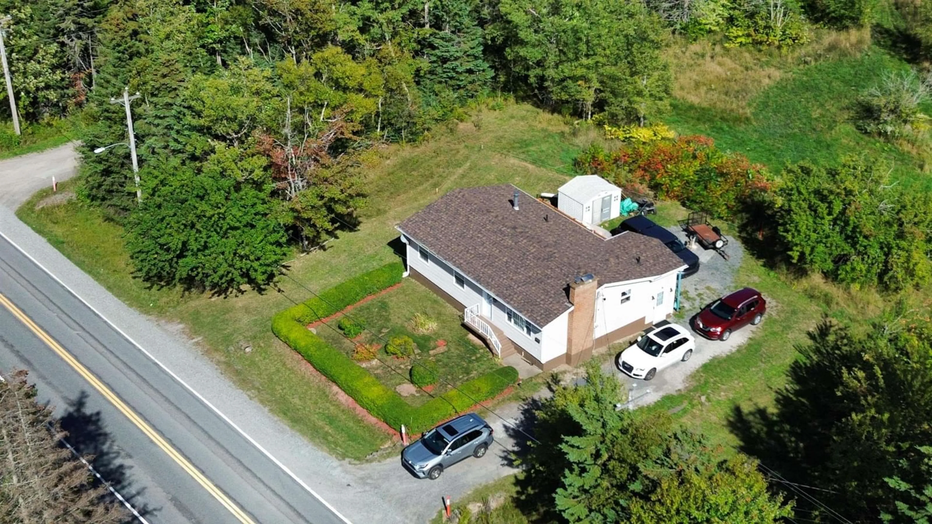 A pic from outside/outdoor area/front of a property/back of a property/a pic from drone, street for 1107 Gabarus Hwy, Prime Brook Nova Scotia B1L 1E5