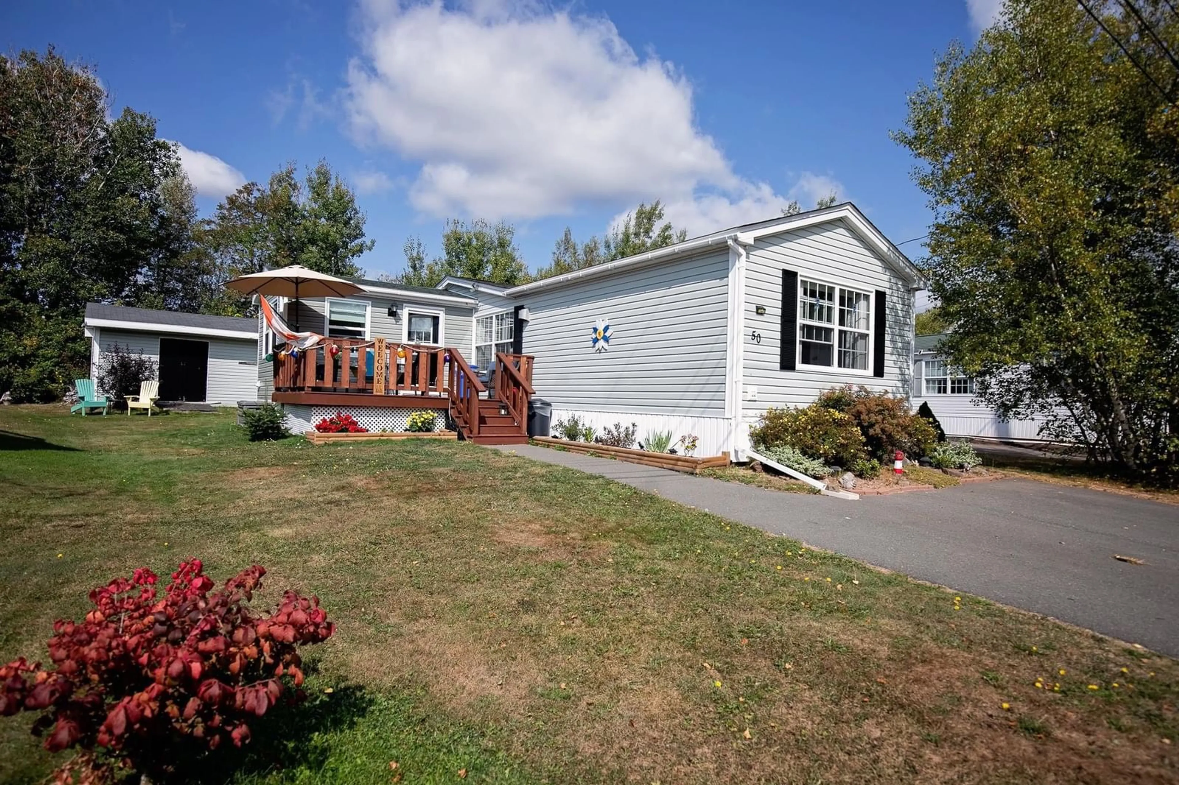 Home with vinyl exterior material, street for 50 Pinehurst St, Amherst Nova Scotia B4H 4X4