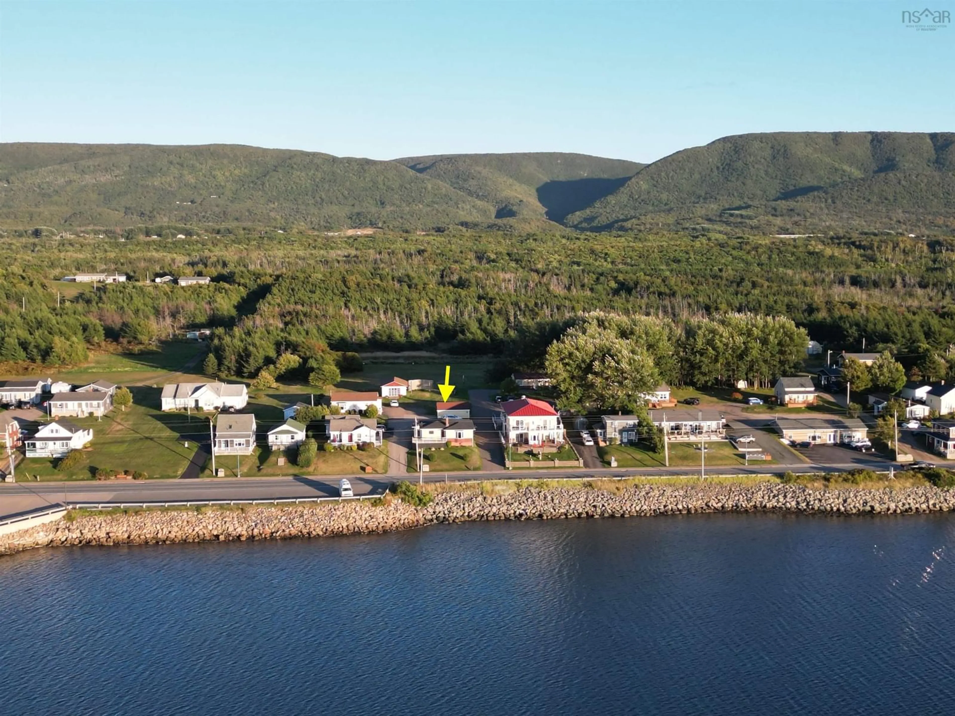 A pic from outside/outdoor area/front of a property/back of a property/a pic from drone, water/lake/river/ocean view for 15052 Cabot Trail Rd, Chéticamp Nova Scotia B0E 1H0
