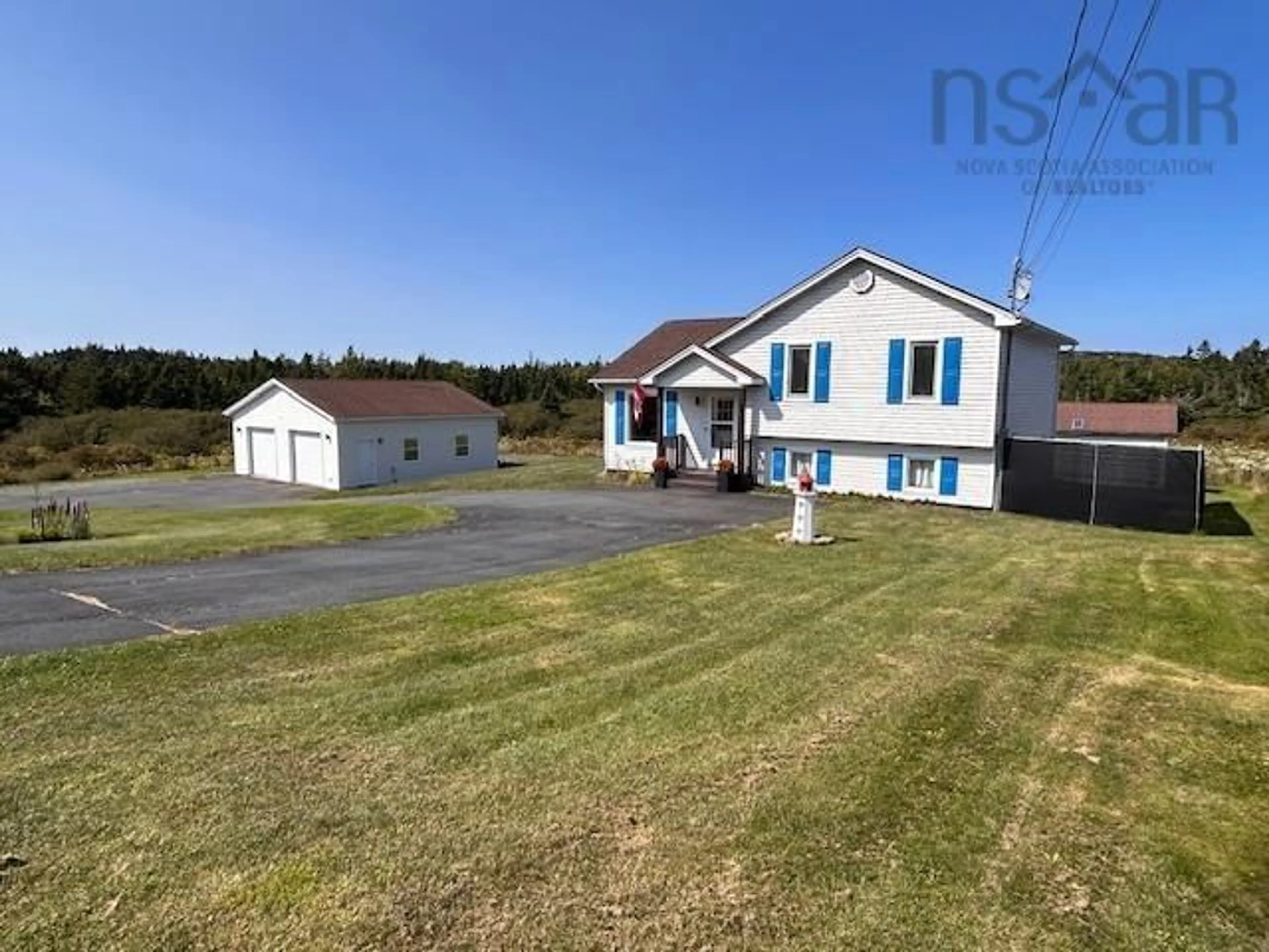 A pic from outside/outdoor area/front of a property/back of a property/a pic from drone, unknown for 1534 Cow Bay Rd, Cow Bay Nova Scotia B3G 1L3