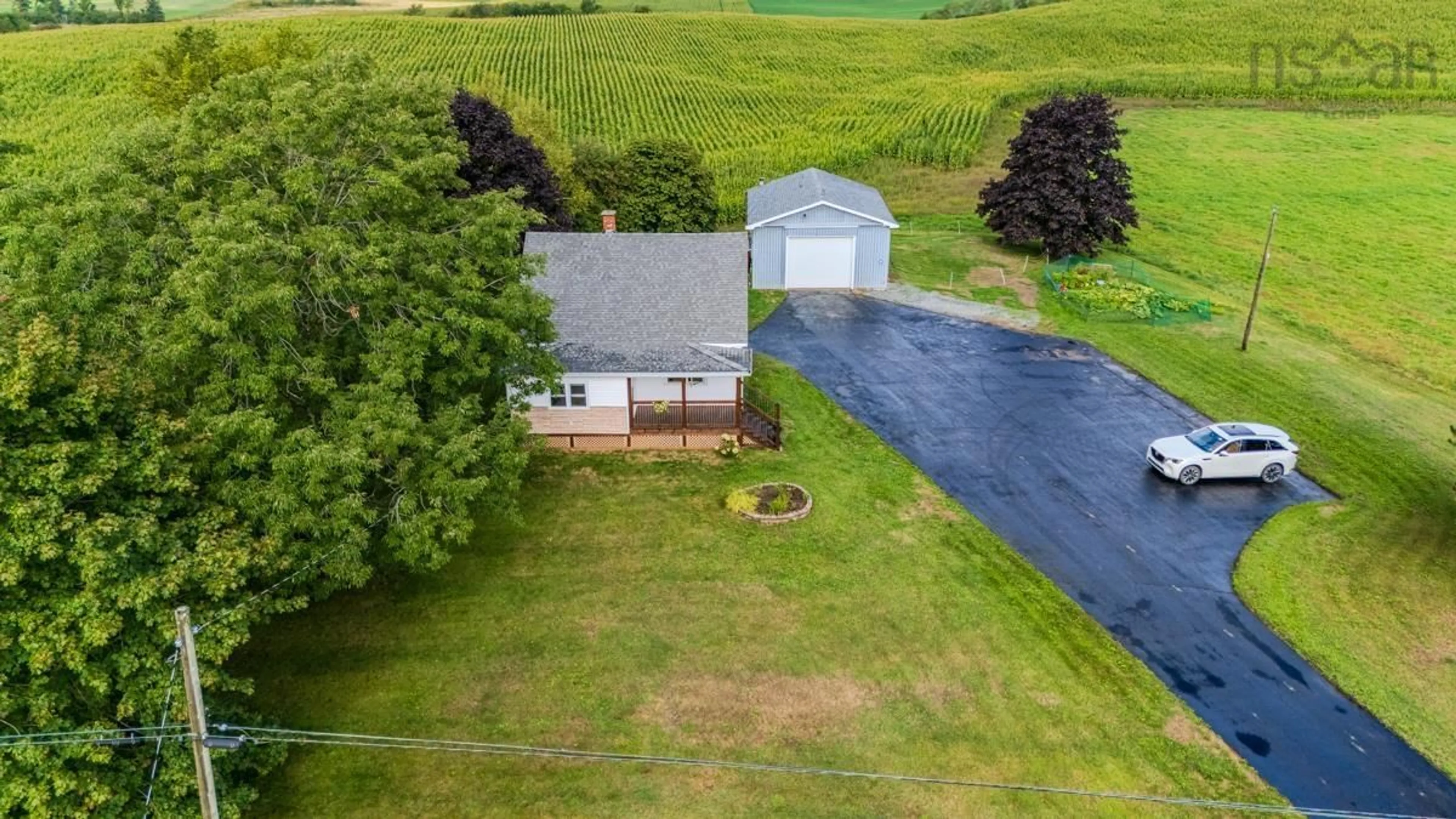 A pic from outside/outdoor area/front of a property/back of a property/a pic from drone, water/lake/river/ocean view for 8229 Highway 14, Hardwood Lands Nova Scotia B0N 1Y0