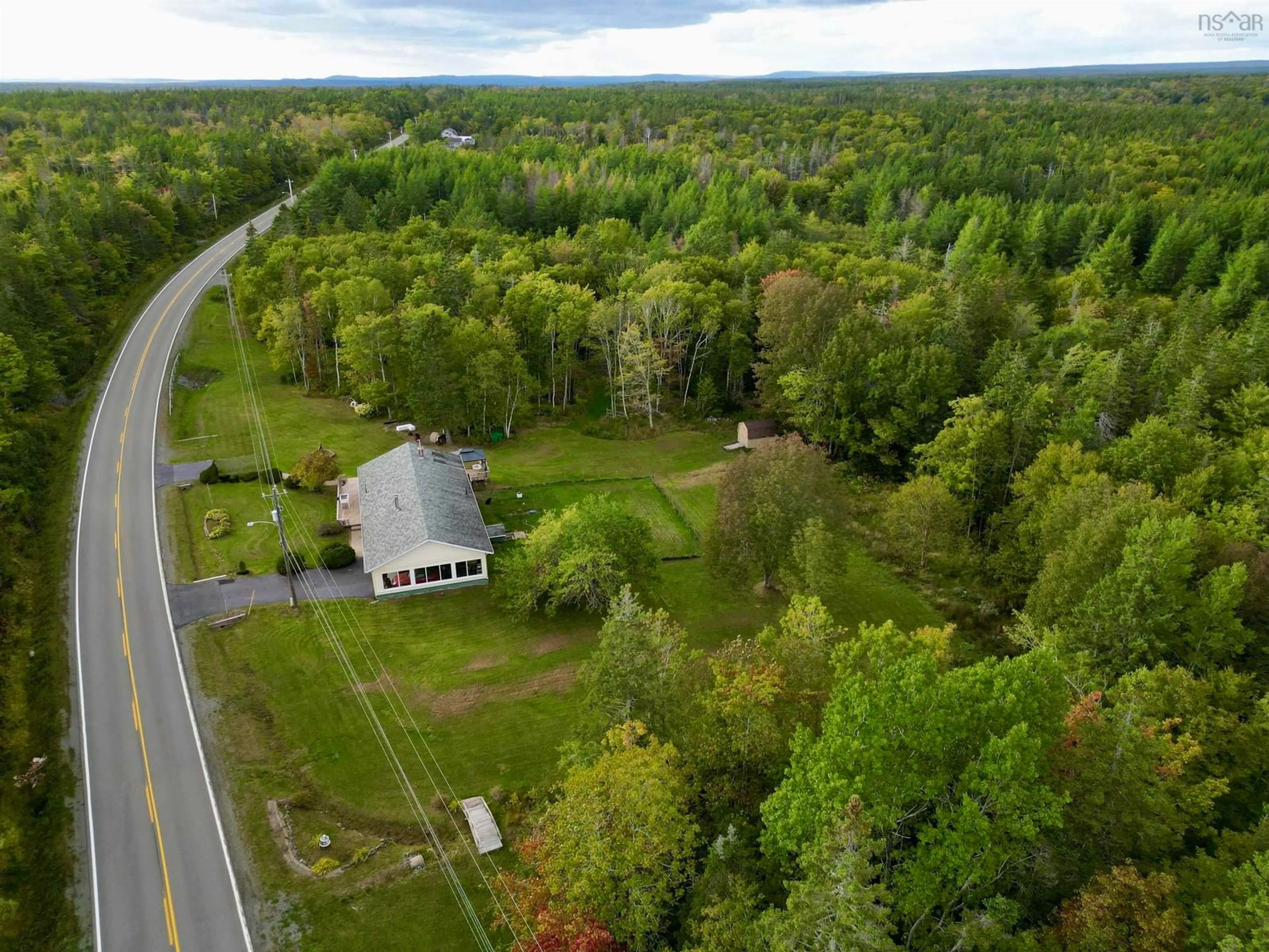 A pic from outside/outdoor area/front of a property/back of a property/a pic from drone, forest/trees view for 5585 Highway 4, Kempt Road Nova Scotia B0E 1J0