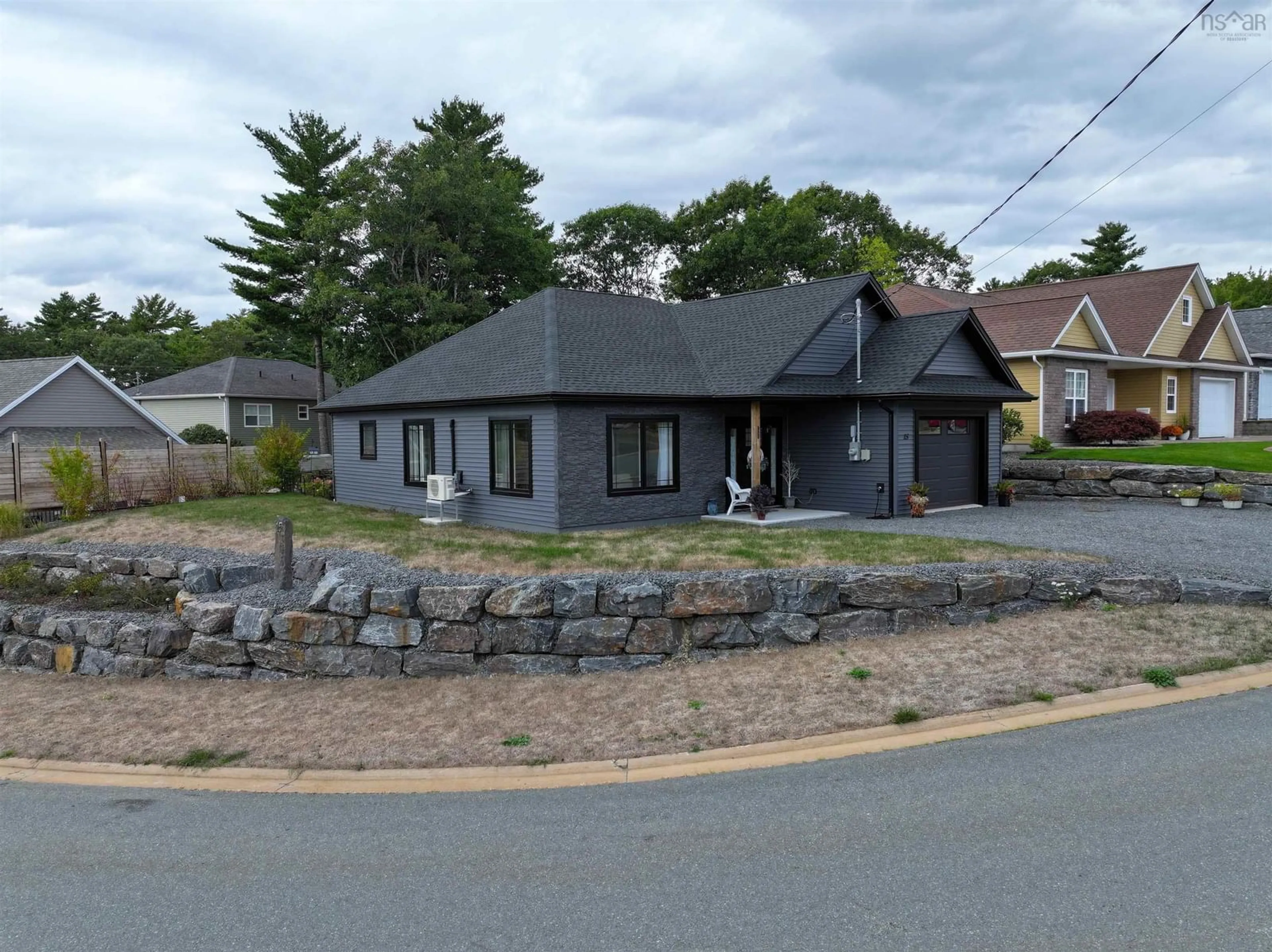 A pic from outside/outdoor area/front of a property/back of a property/a pic from drone, street for 15 Dr Ernst Crt, Bridgewater Nova Scotia B4V 9A3