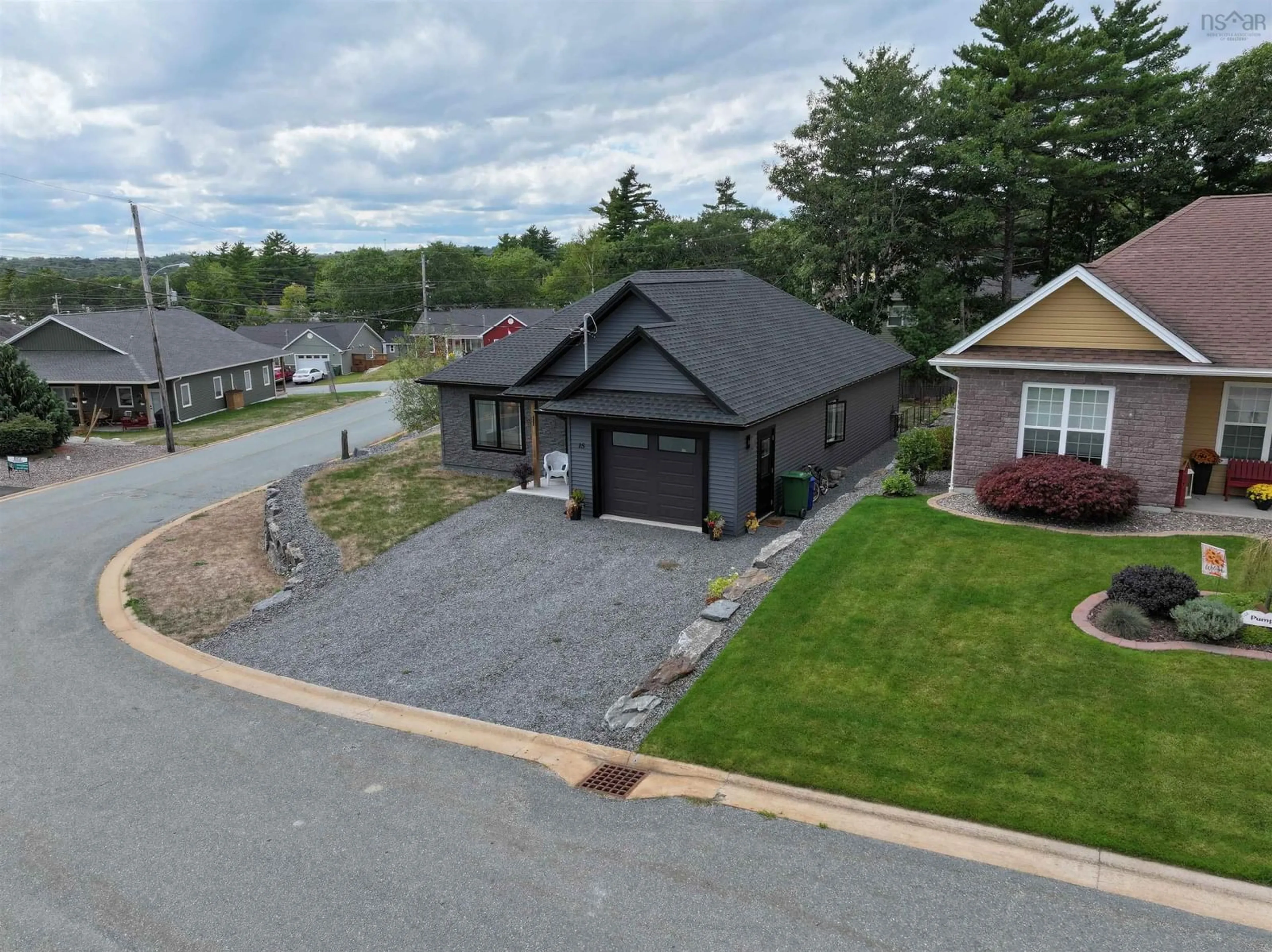 A pic from outside/outdoor area/front of a property/back of a property/a pic from drone, unknown for 15 Dr Ernst Crt, Bridgewater Nova Scotia B4V 9A3
