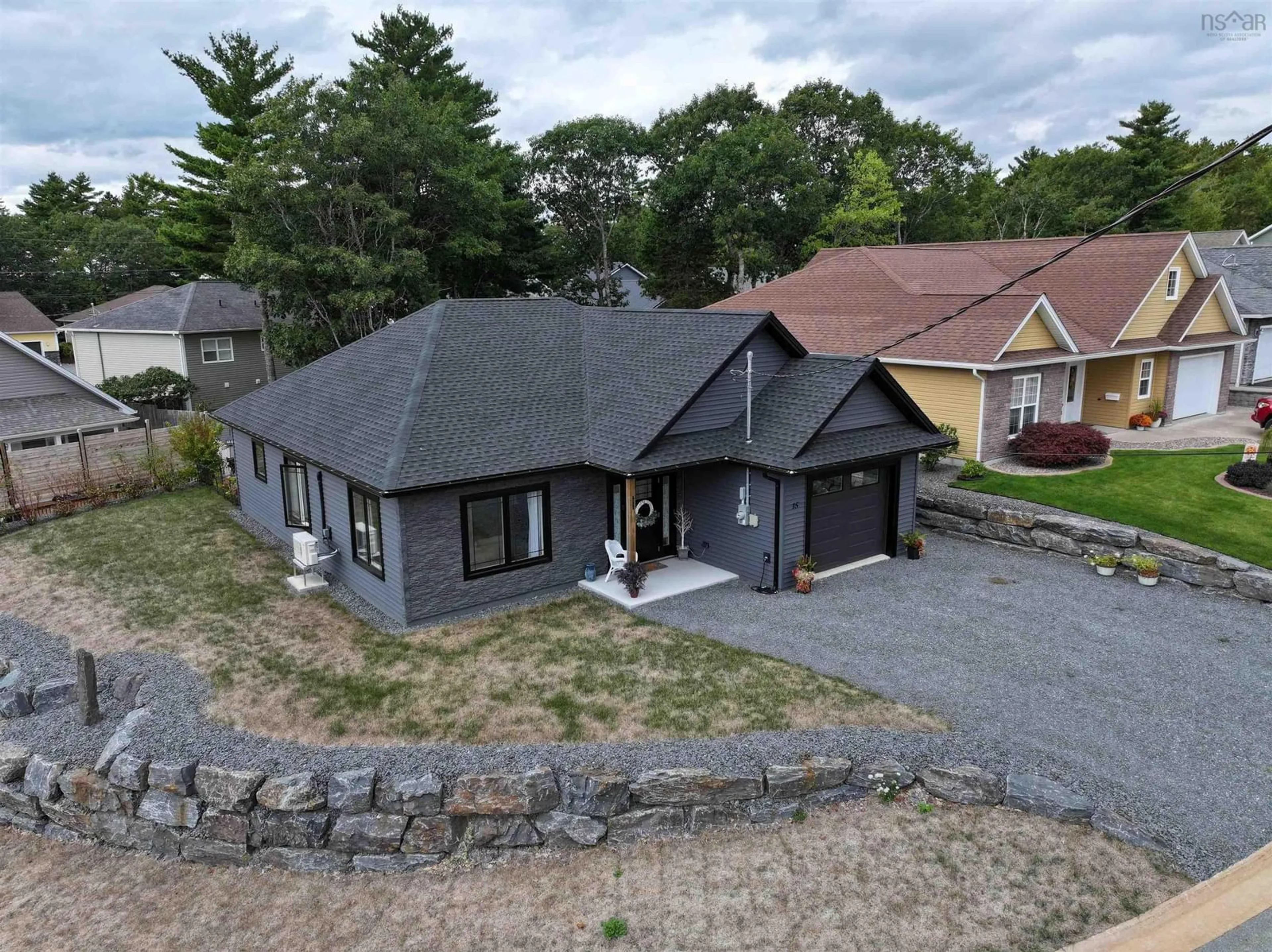 A pic from outside/outdoor area/front of a property/back of a property/a pic from drone, unknown for 15 Dr Ernst Crt, Bridgewater Nova Scotia B4V 9A3