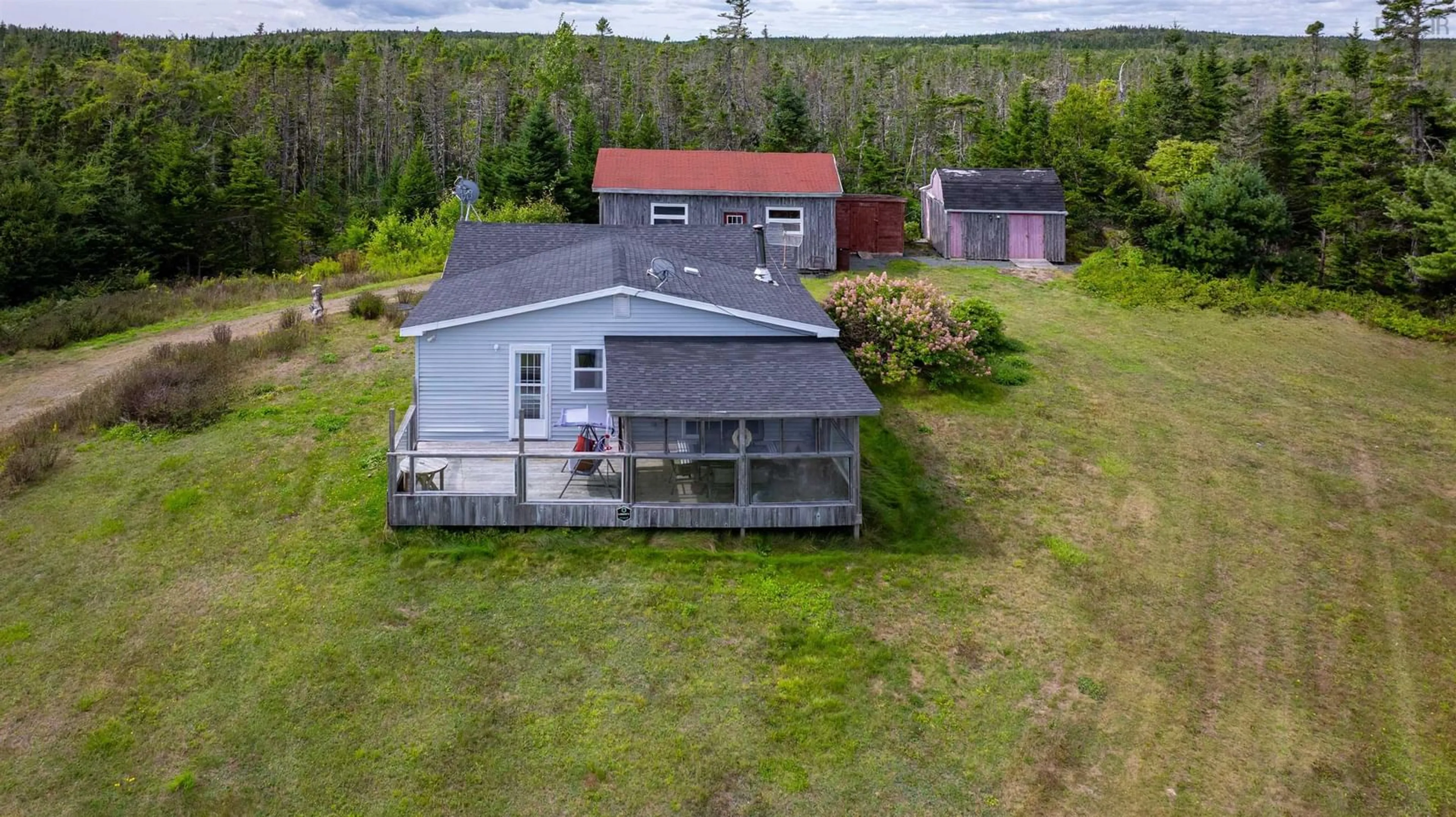 A pic from outside/outdoor area/front of a property/back of a property/a pic from drone, building for 28507 7 Hwy, Moser River Nova Scotia B0J 2K0