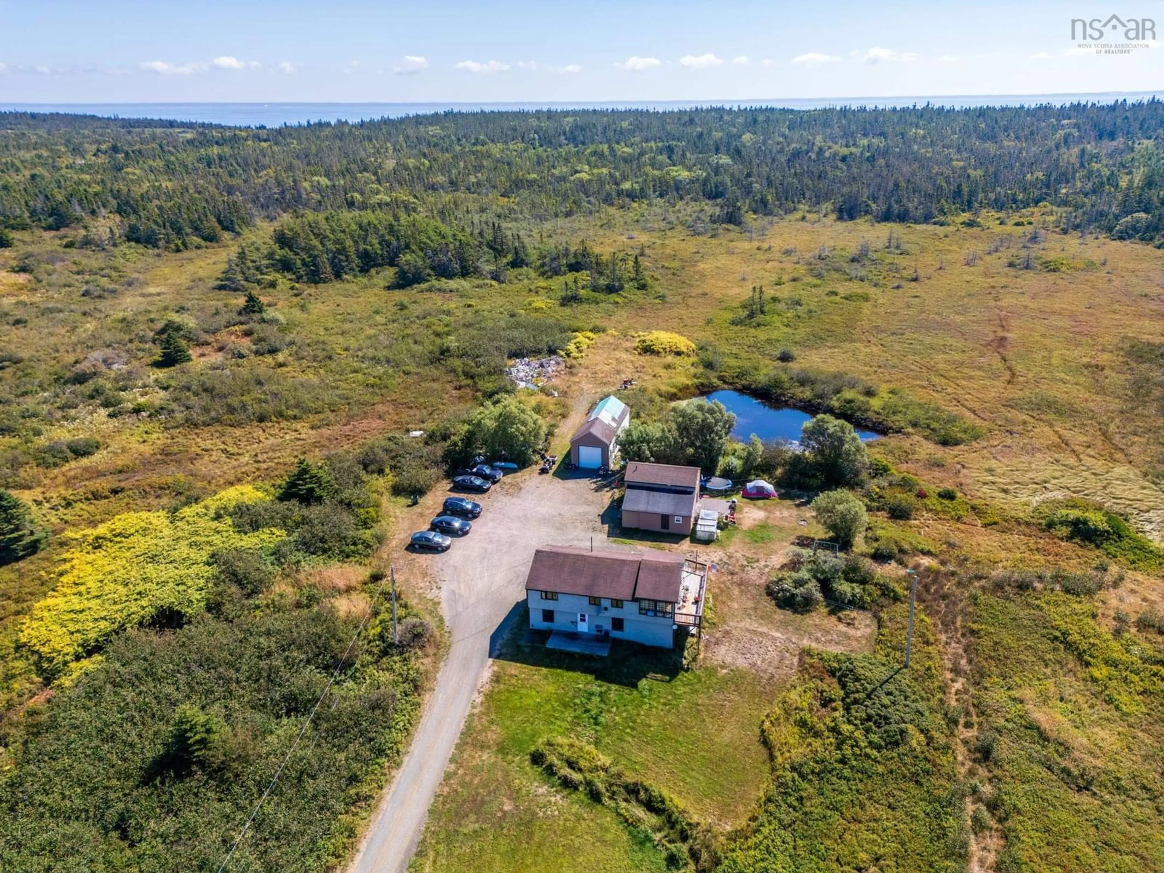 A pic from outside/outdoor area/front of a property/back of a property/a pic from drone, unknown for 171 173 Overcove Road, Freeport Nova Scotia B0V 1B0