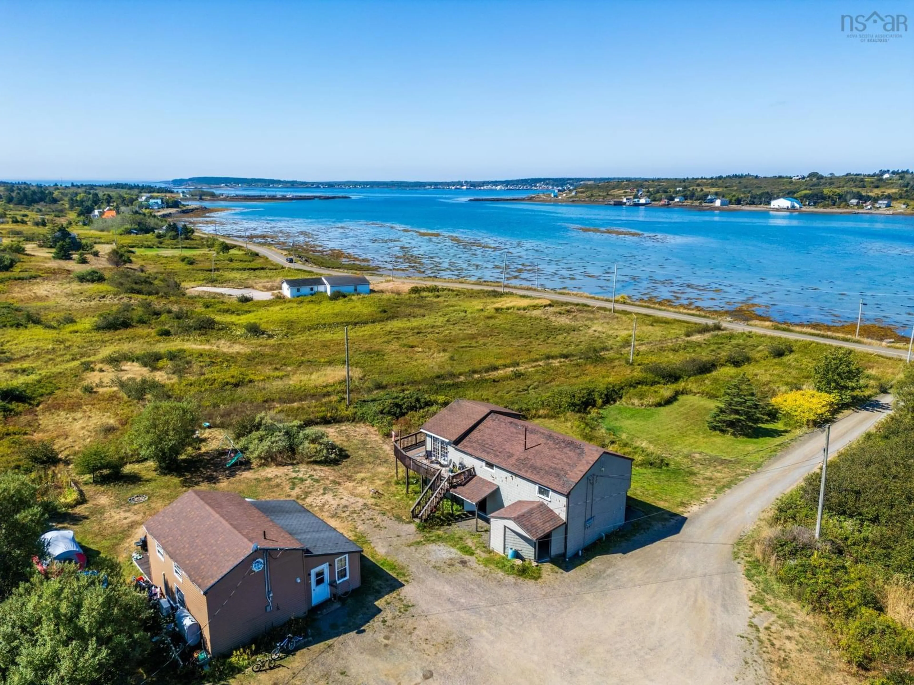 A pic from outside/outdoor area/front of a property/back of a property/a pic from drone, water/lake/river/ocean view for 171 173 Overcove Road, Freeport Nova Scotia B0V 1B0