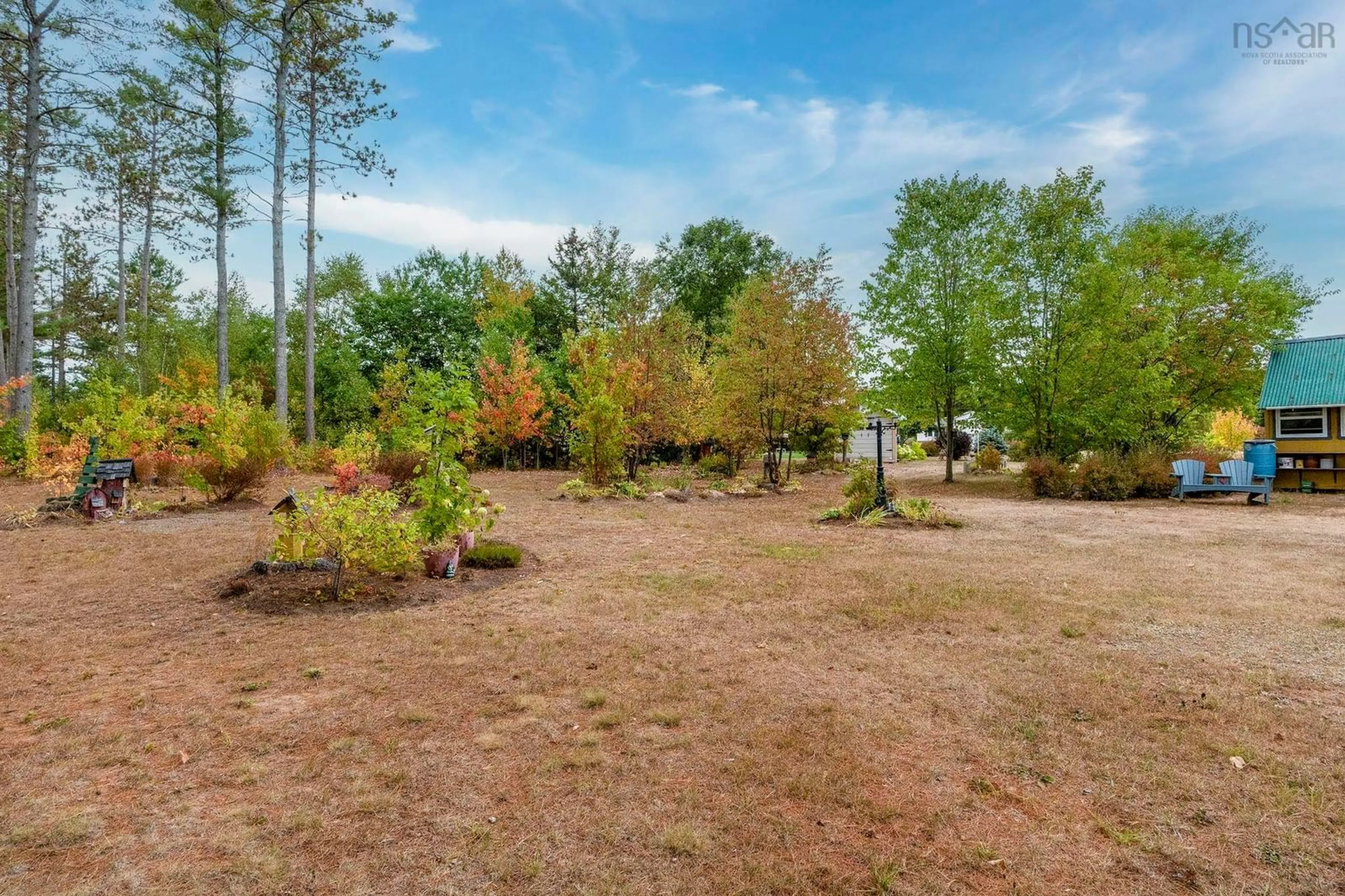 A pic from outside/outdoor area/front of a property/back of a property/a pic from drone, forest/trees view for 75 Cook Ave, Wilmot Nova Scotia B0P 1W0