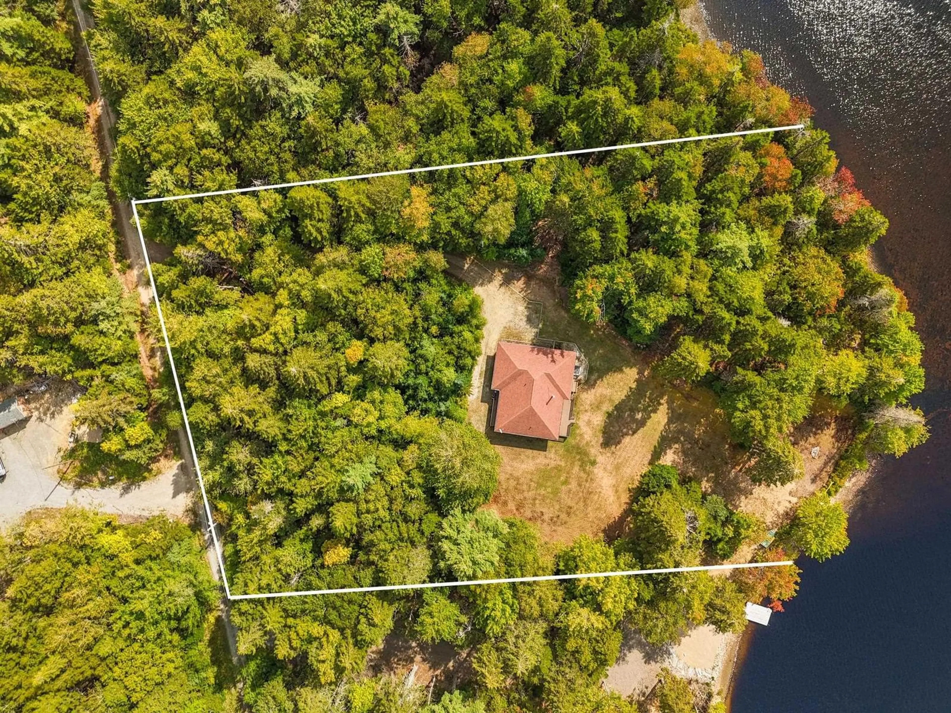 A pic from outside/outdoor area/front of a property/back of a property/a pic from drone, water/lake/river/ocean view for 151 Lake Shore Dr, Briar Lake Nova Scotia B0W 3T0