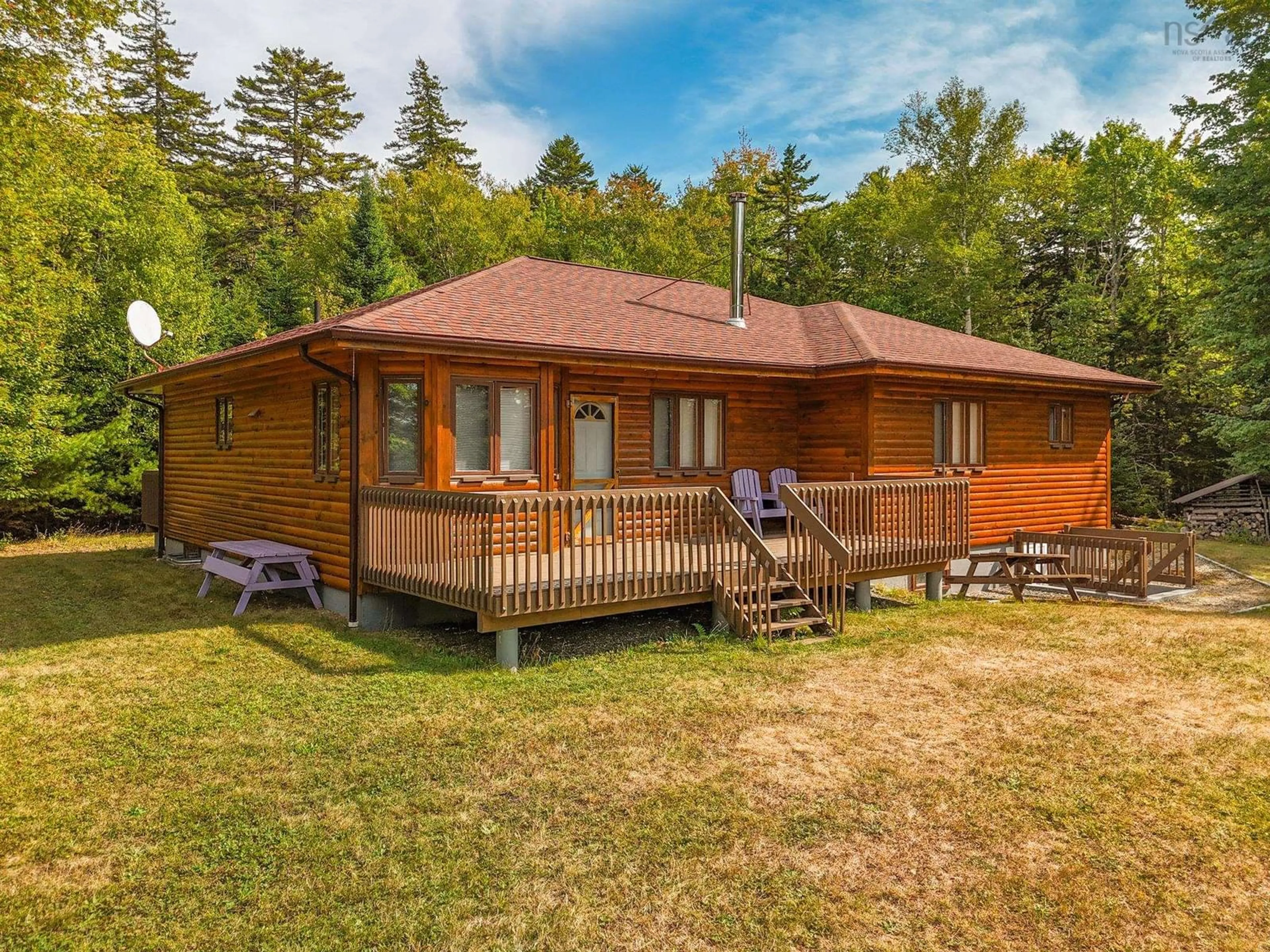 A pic from outside/outdoor area/front of a property/back of a property/a pic from drone, water/lake/river/ocean view for 151 Lake Shore Dr, Briar Lake Nova Scotia B0W 3T0