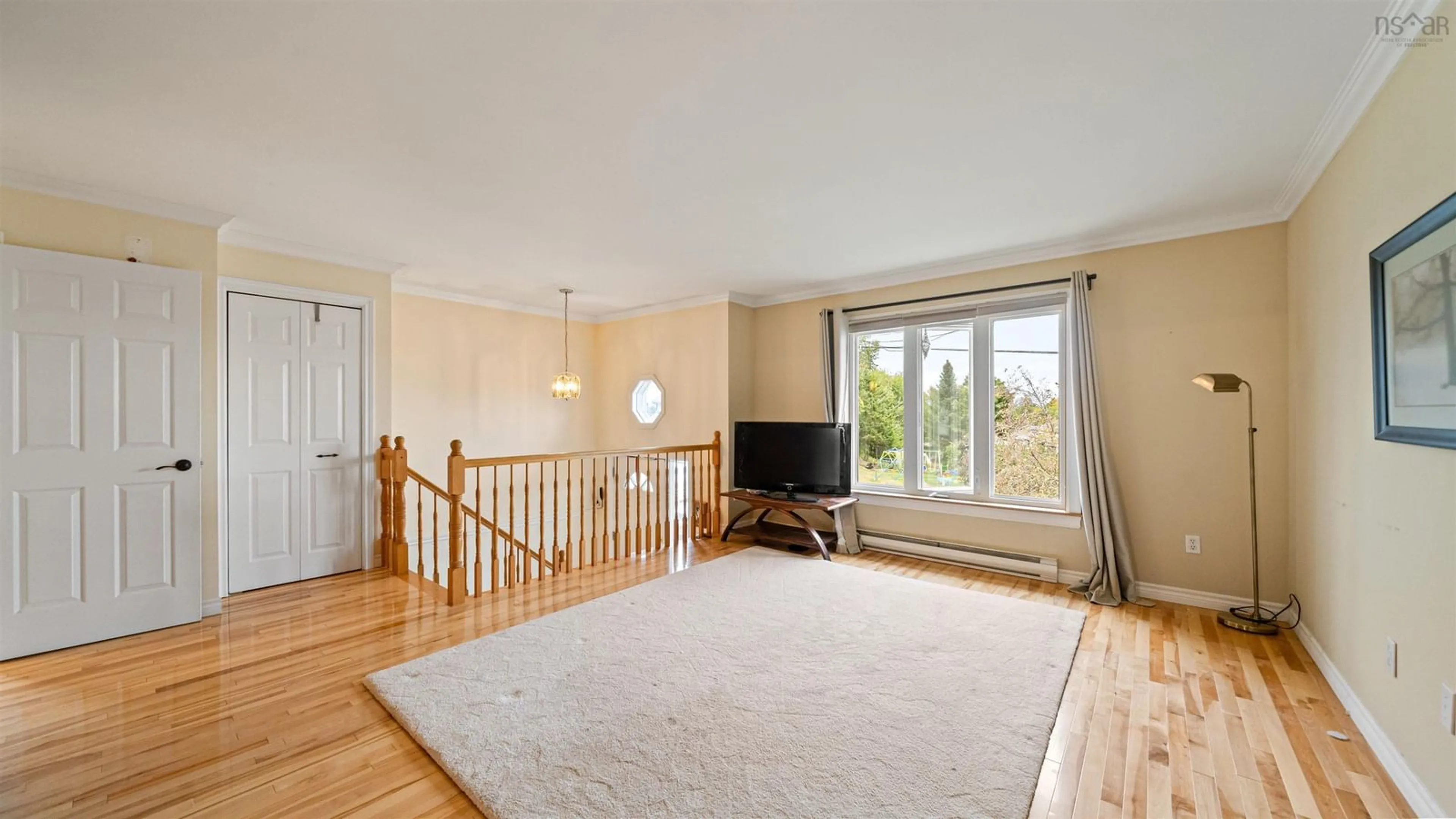 Living room with furniture, wood/laminate floor for 117 Lumberman Dr, Middle Sackville Nova Scotia B4E 2W1