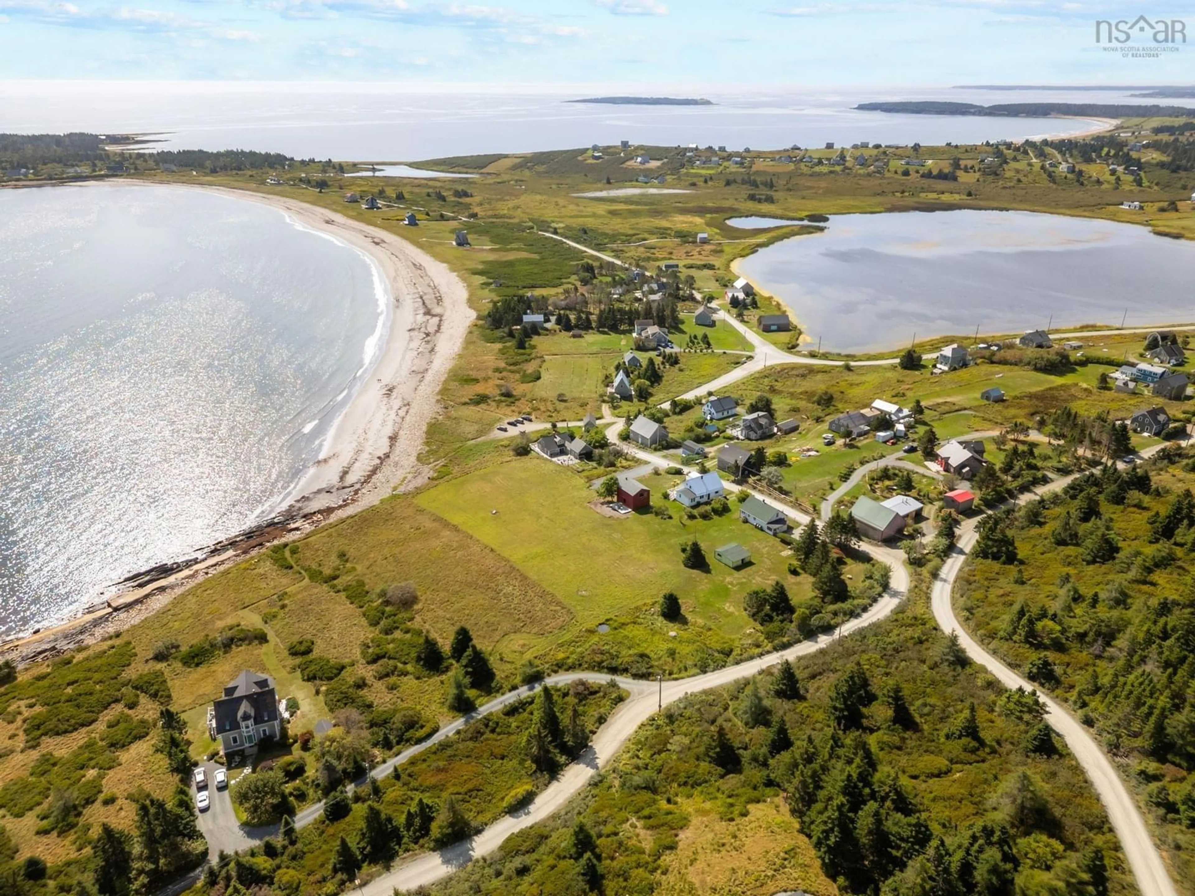 A pic from outside/outdoor area/front of a property/back of a property/a pic from drone, water/lake/river/ocean view for 85 Mosher Rd, Kingsburg Nova Scotia B0J 2X0