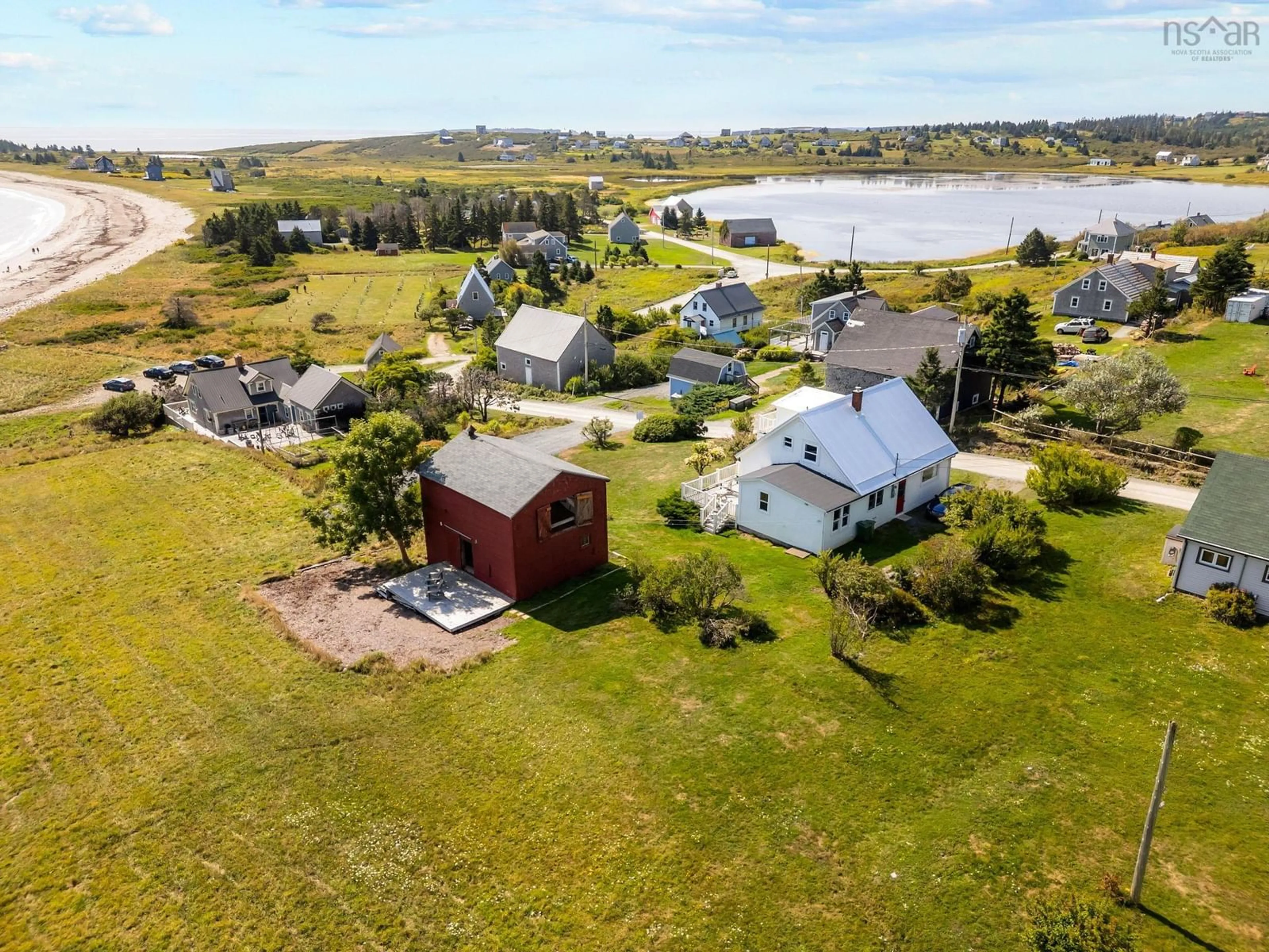 A pic from outside/outdoor area/front of a property/back of a property/a pic from drone, water/lake/river/ocean view for 85 Mosher Rd, Kingsburg Nova Scotia B0J 2X0