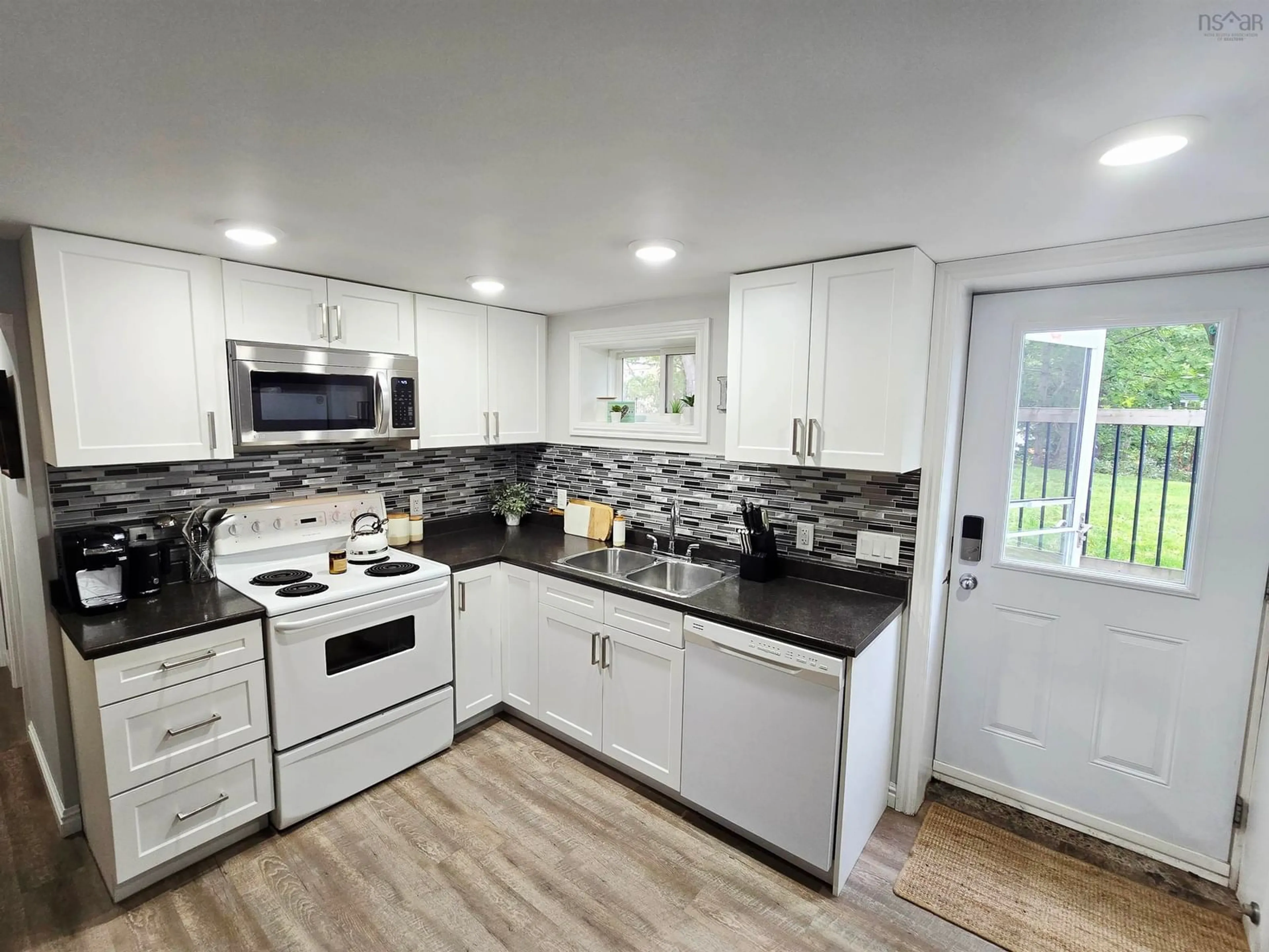 Open concept kitchen, unknown for 4 Ida St, Spryfield Nova Scotia B3P 1W9