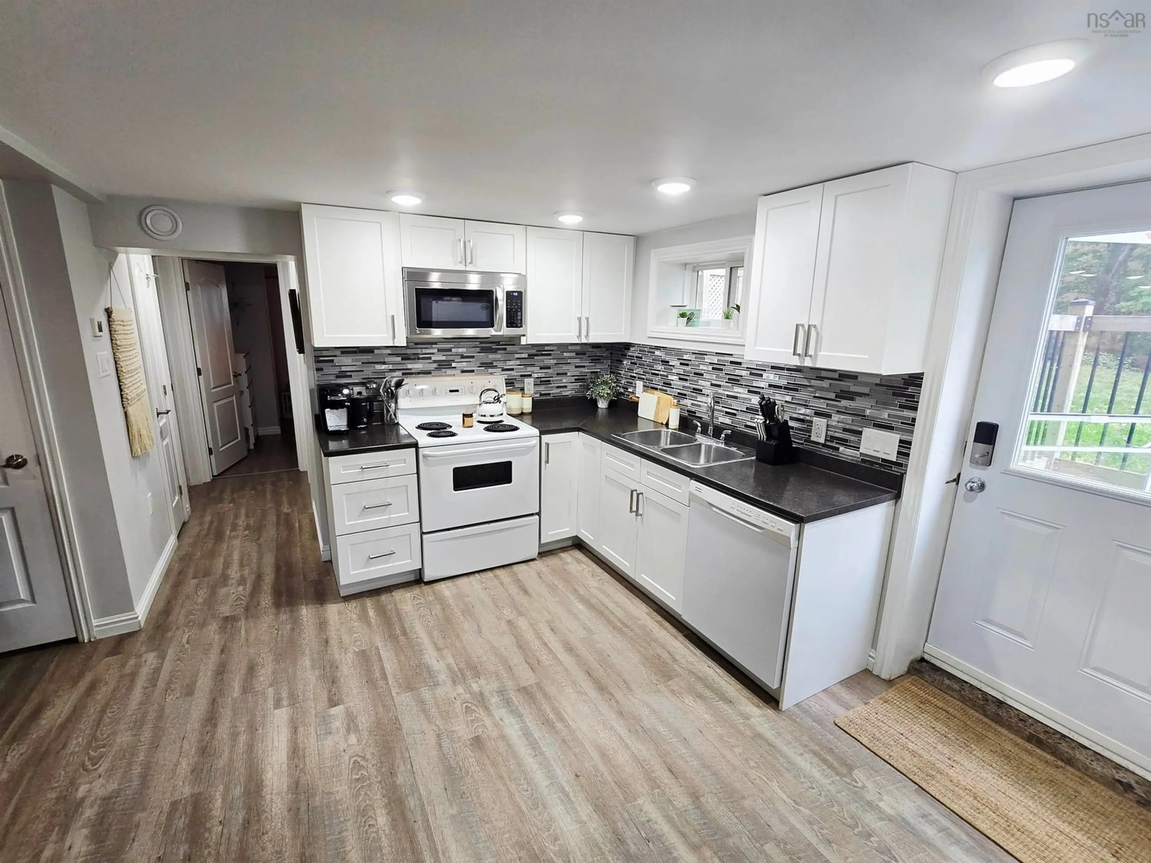 Open concept kitchen, unknown for 4 Ida St, Spryfield Nova Scotia B3P 1W9