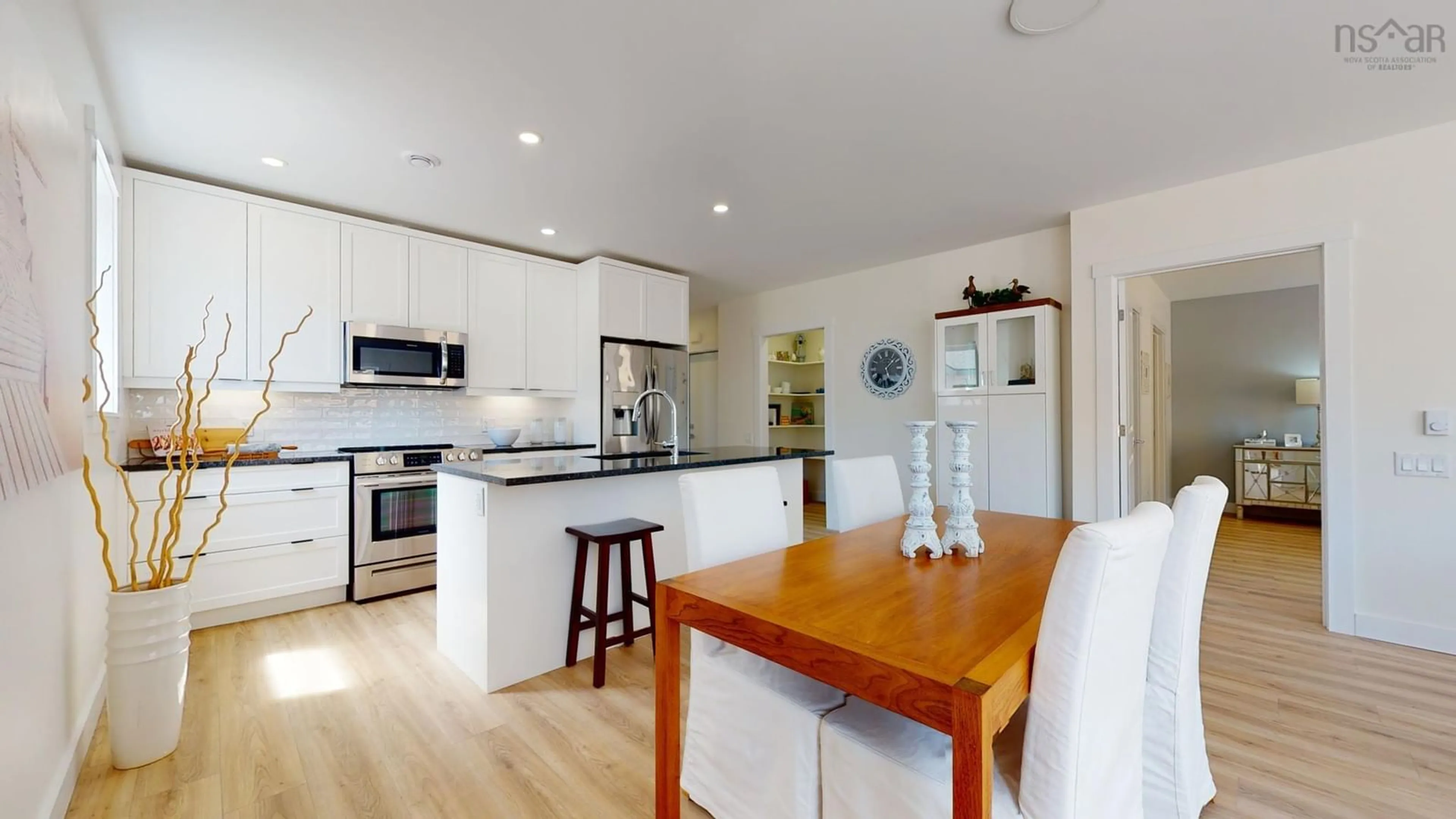 Open concept kitchen, wood/laminate floor for 202 Sailors Trail, Eastern Passage Nova Scotia B3G 0A3