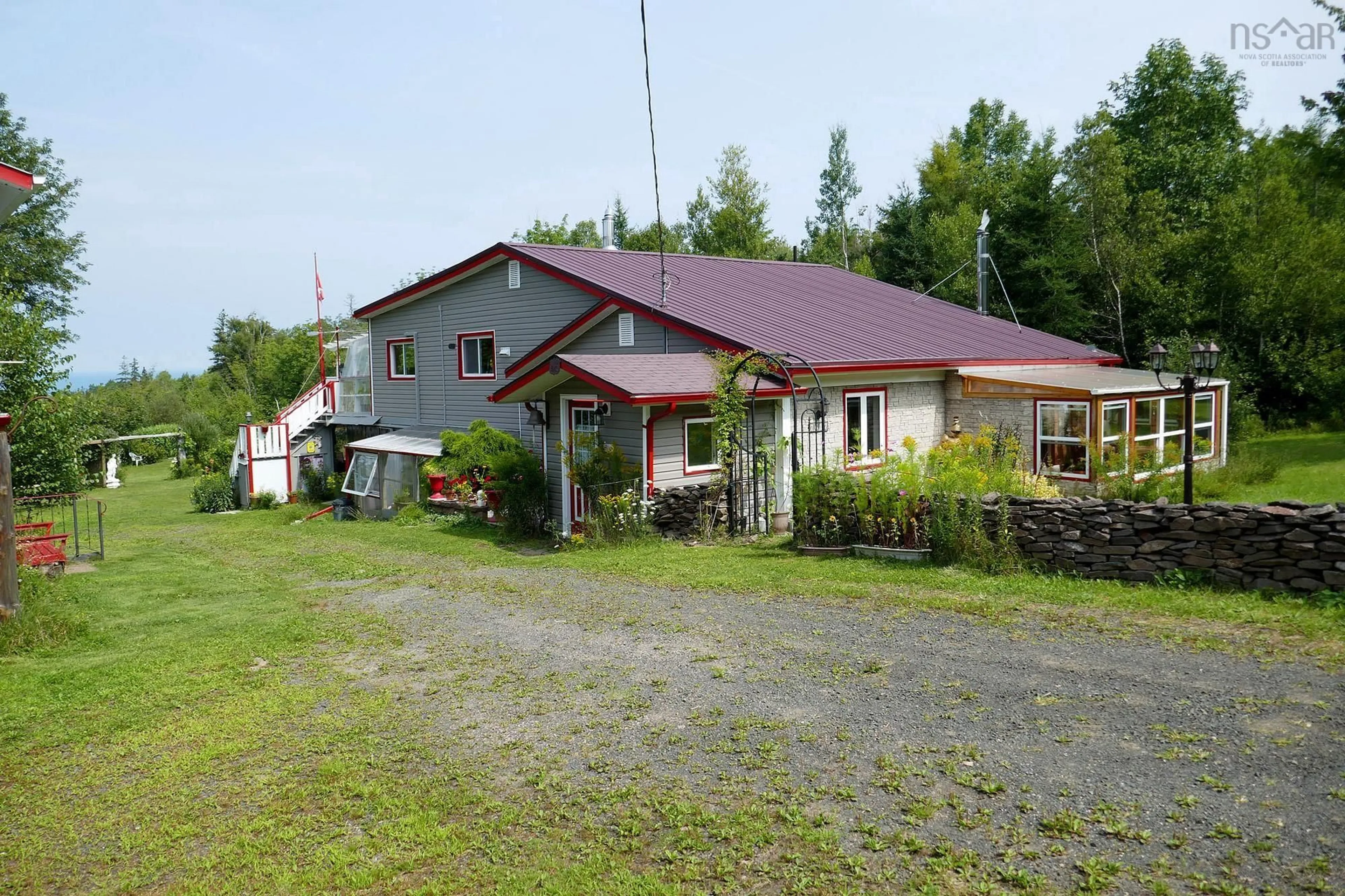 A pic from outside/outdoor area/front of a property/back of a property/a pic from drone, building for 7617 Shore Rd, Hampton Nova Scotia B0S 1L0