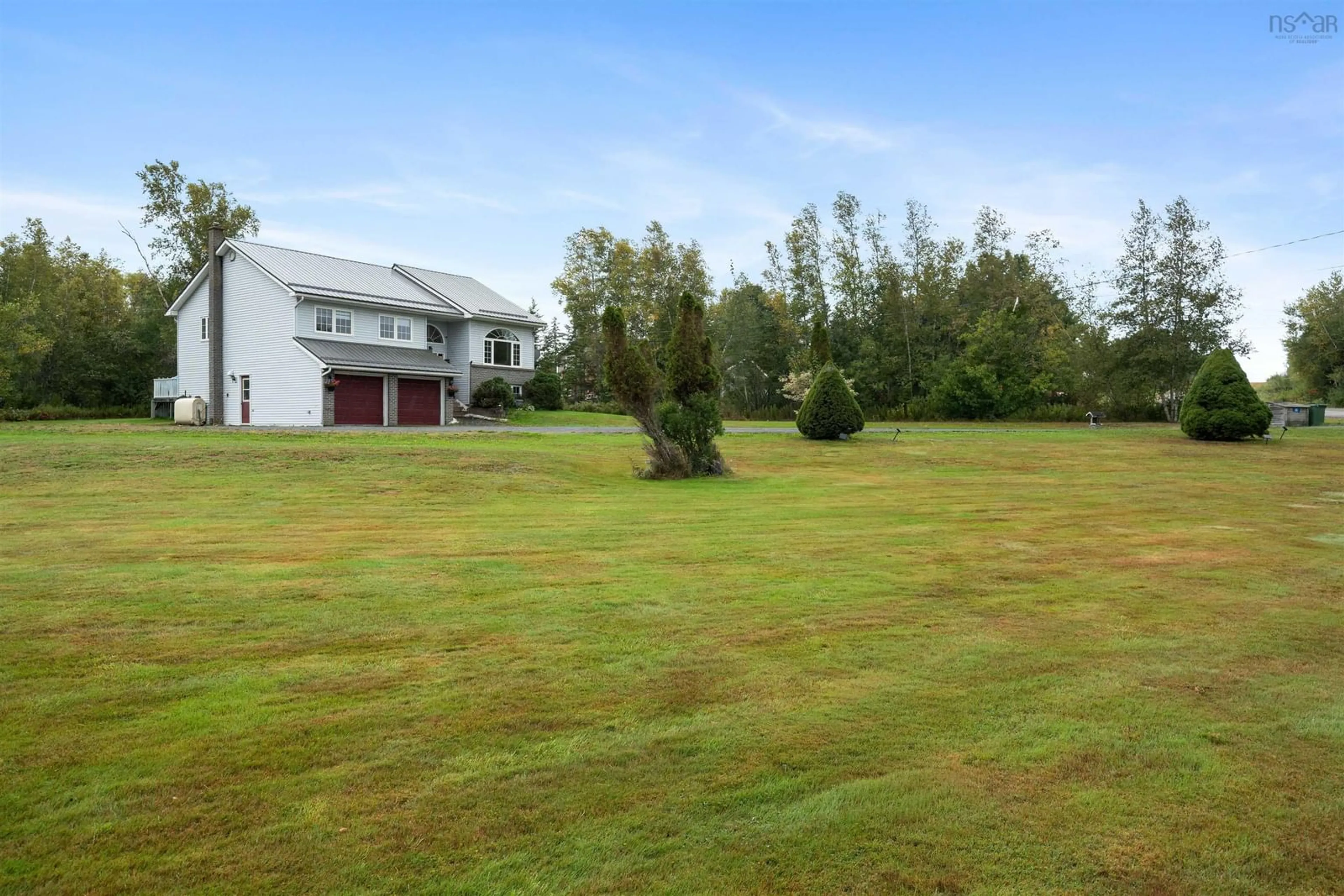 A pic from outside/outdoor area/front of a property/back of a property/a pic from drone, water/lake/river/ocean view for 55 Pleasant Dr, Lyons Brook Nova Scotia B0K 1H0