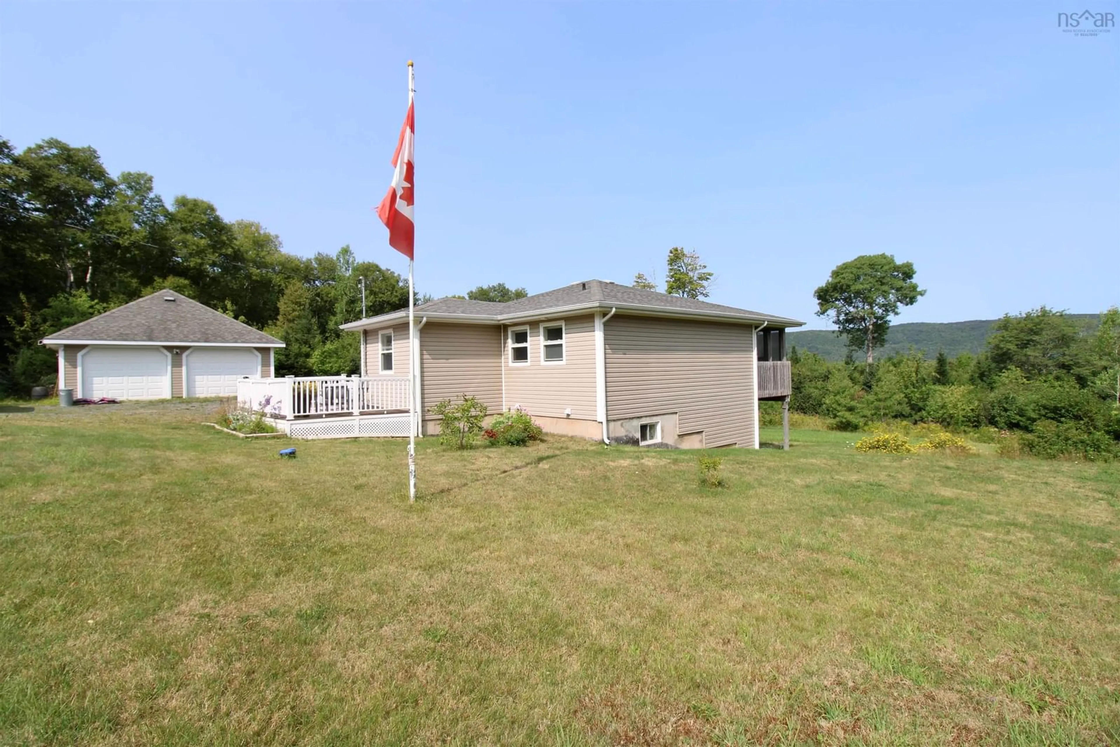 A pic from outside/outdoor area/front of a property/back of a property/a pic from drone, unknown for 11599 Kempt Head Rd, Boularderie Center Nova Scotia B1X 1K6