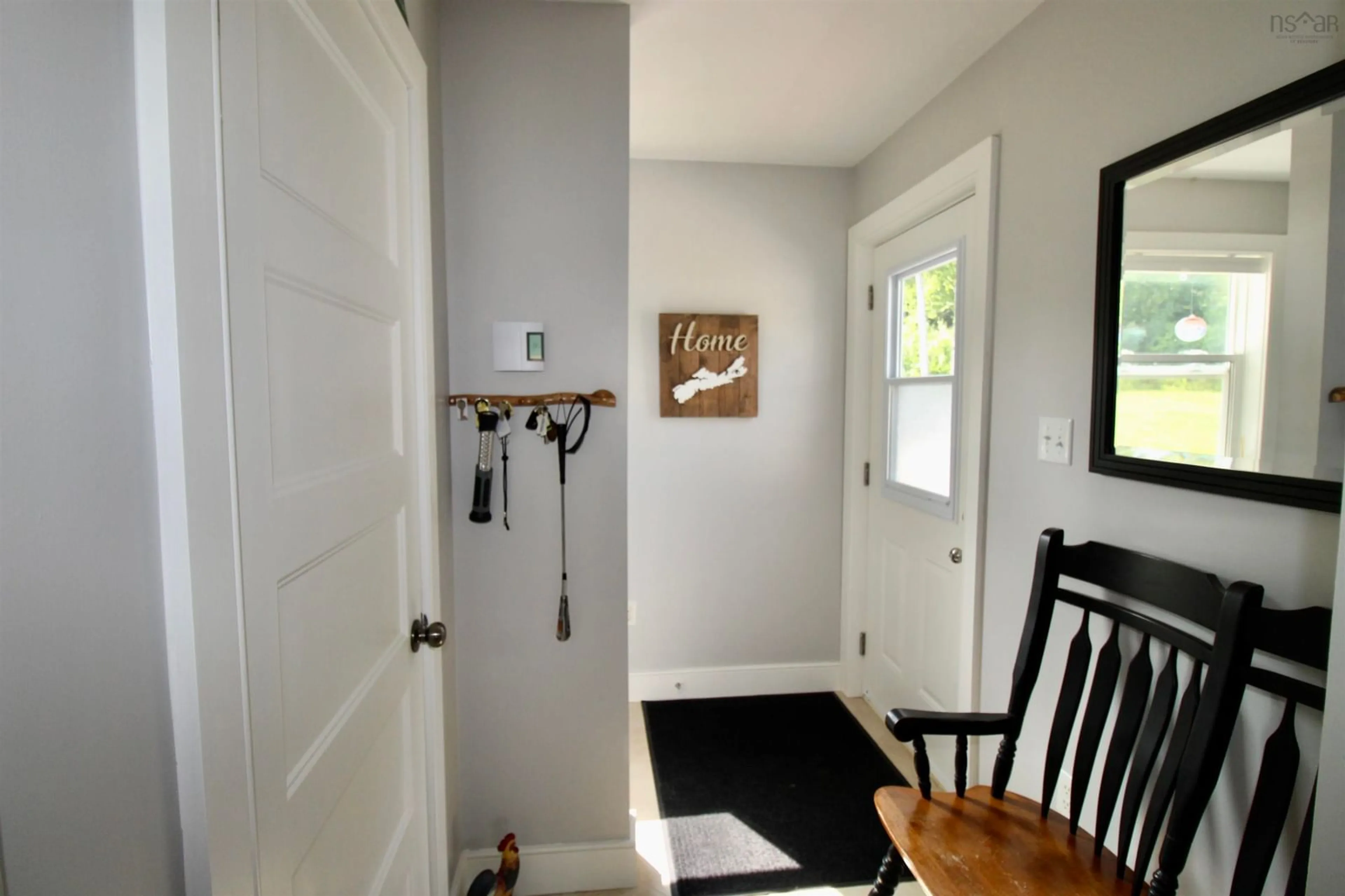 Indoor entryway for 11599 Kempt Head Rd, Boularderie Center Nova Scotia B1X 1K6