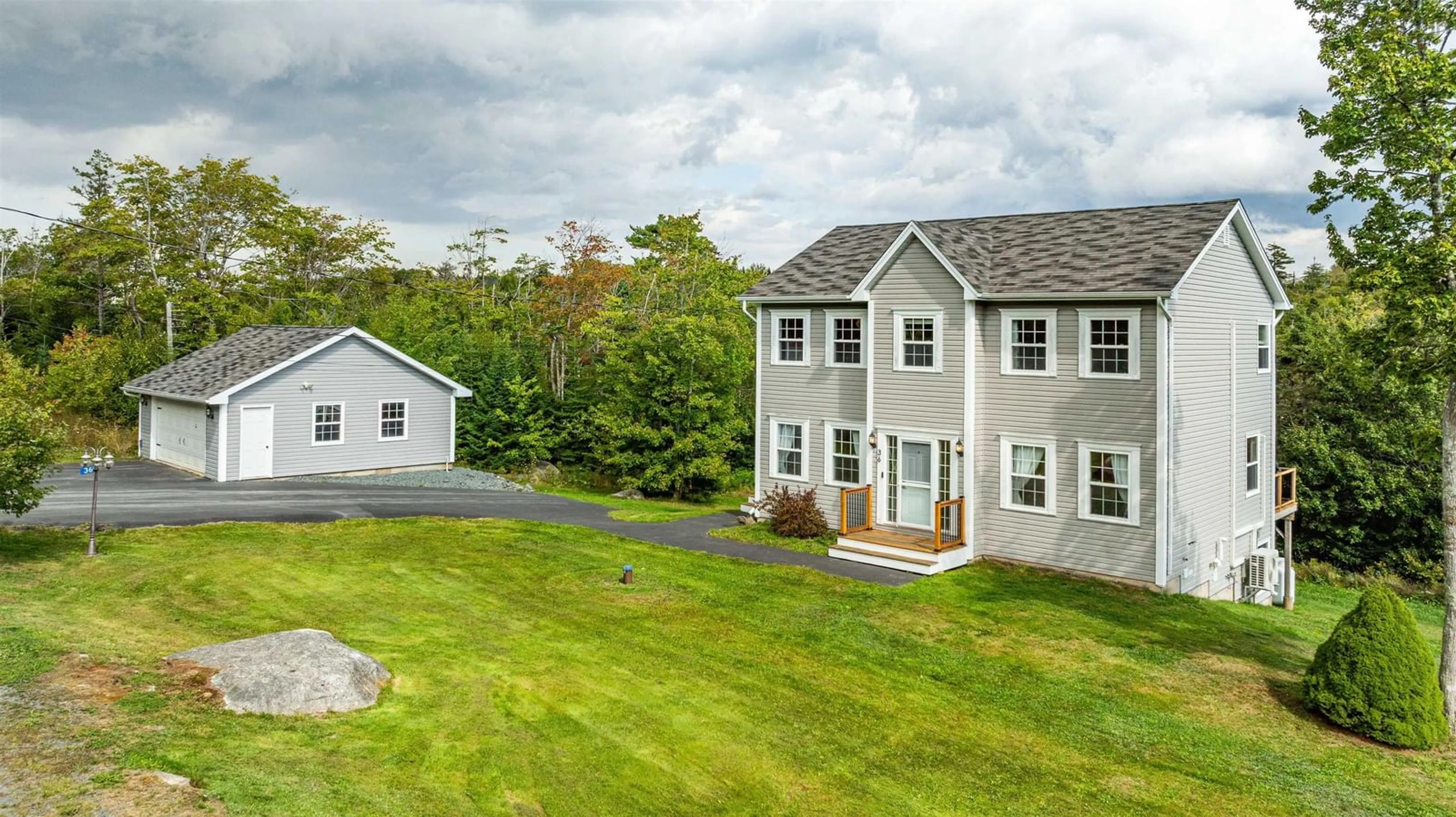 A pic from outside/outdoor area/front of a property/back of a property/a pic from drone, unknown for 36 Elderberry Lane, Brookside Nova Scotia B3T 2L4