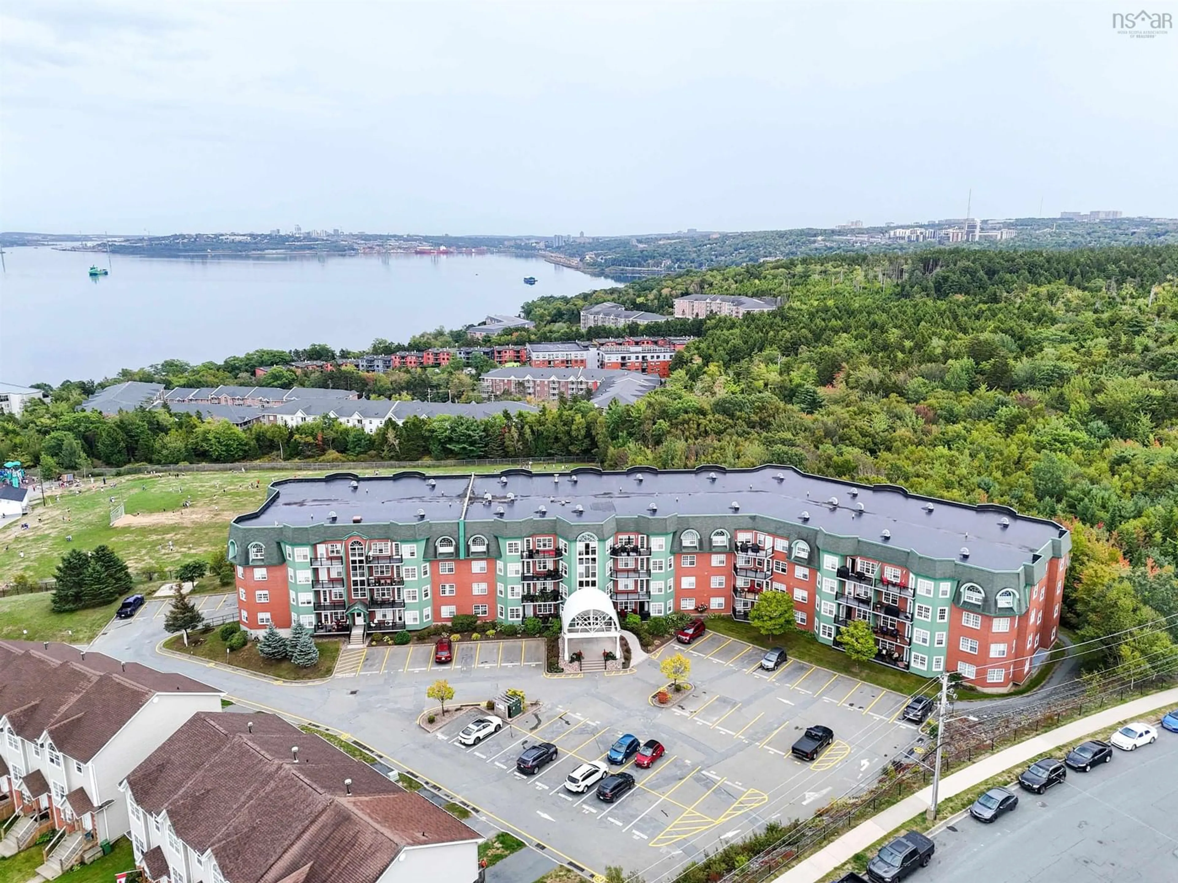 A pic from outside/outdoor area/front of a property/back of a property/a pic from drone, water/lake/river/ocean view for 116 Larry Uteck Blvd #103, Halifax Nova Scotia B3M 4Y1