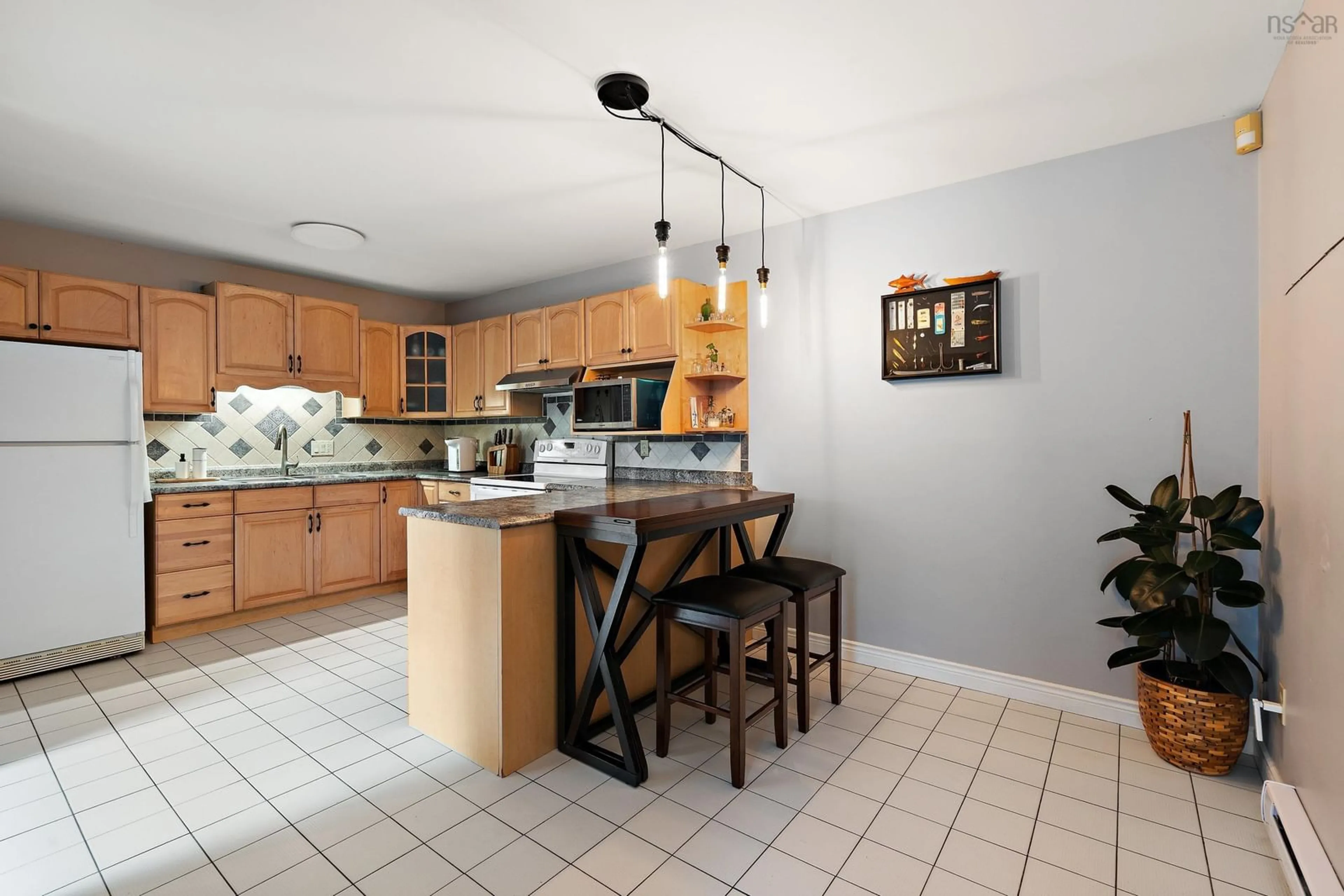 Open concept kitchen, ceramic/tile floor for 18 Bryden Ave, Halifax Nova Scotia B3P 1H2