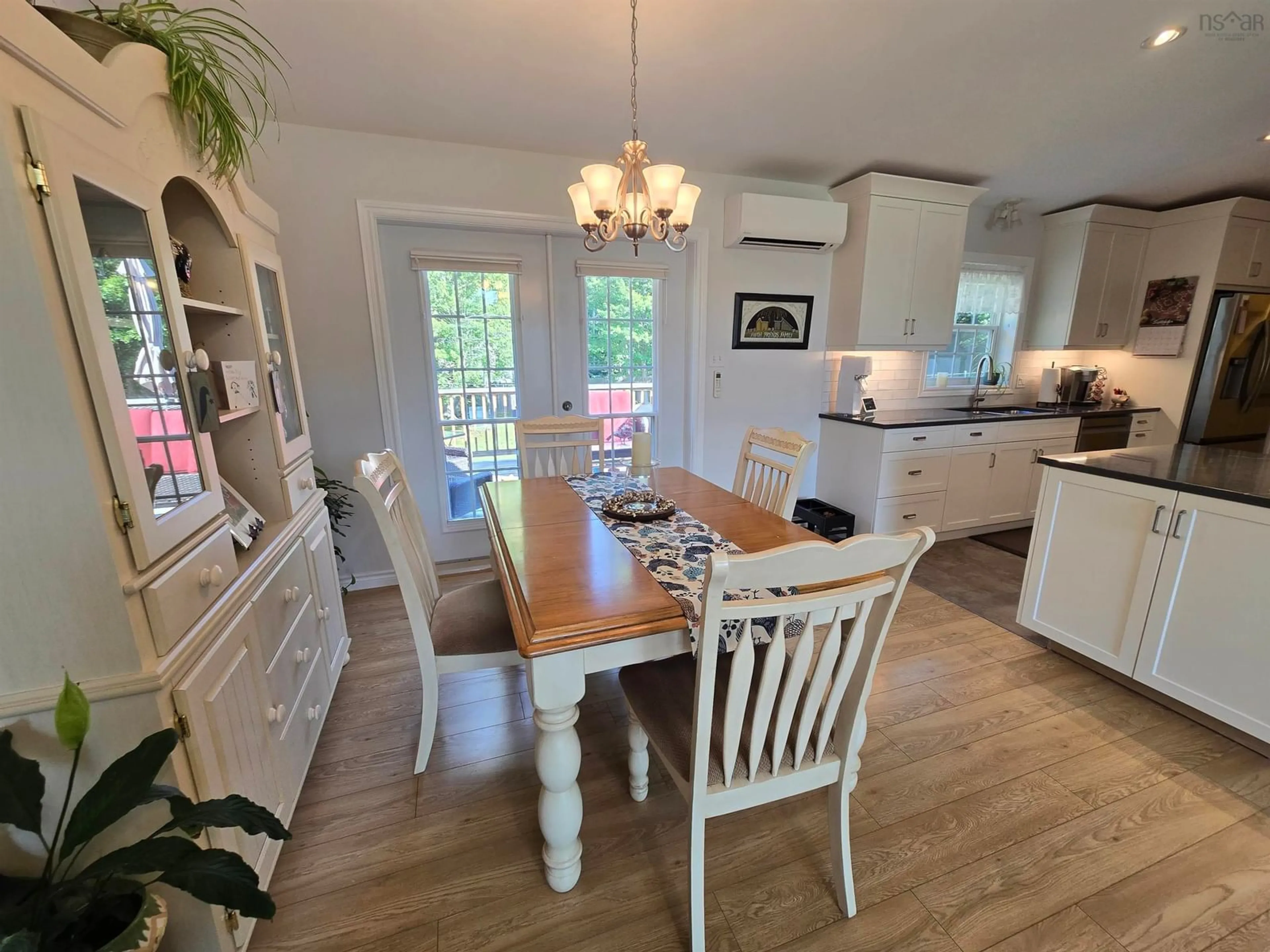 Open concept kitchen, wood/laminate floor for 26 Aspen Crt, Conquerall Bank Nova Scotia B4V 0G6