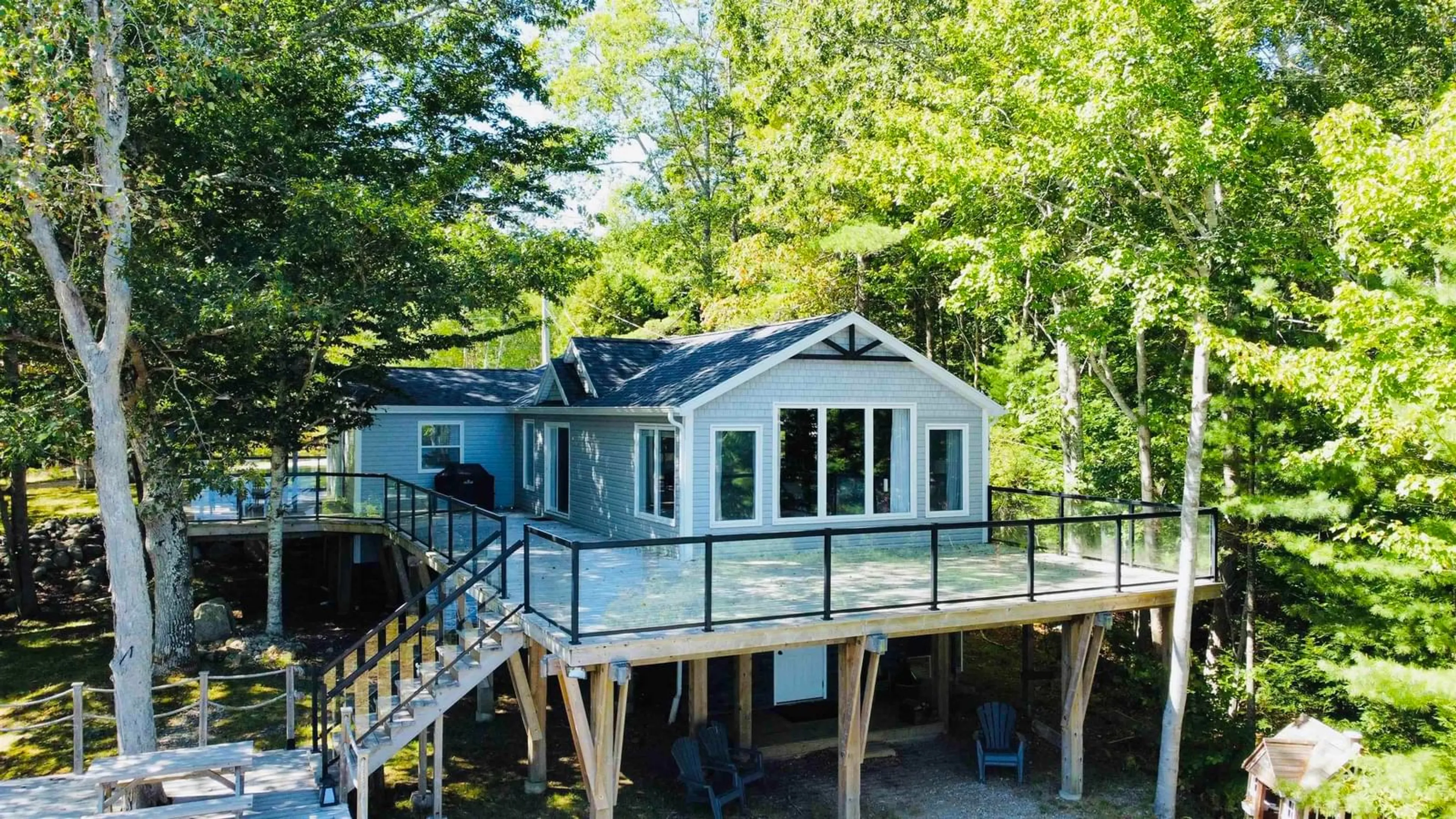 Home with vinyl exterior material, water/lake/river/ocean view for 2760 Highway 203, Middle Ohio Nova Scotia B0T 1W0