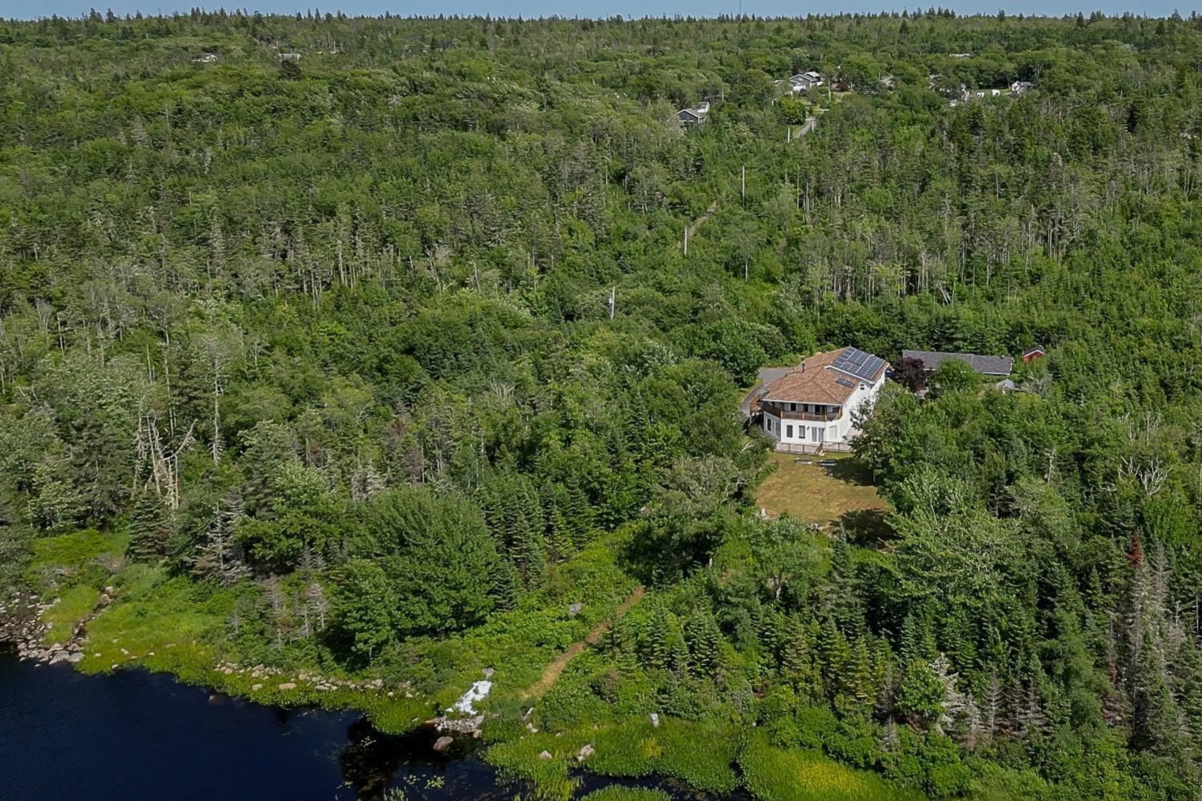 A pic from outside/outdoor area/front of a property/back of a property/a pic from drone, water/lake/river/ocean view for 80 Stoney Beach Rd, Whites Lake Nova Scotia B3T 1V9