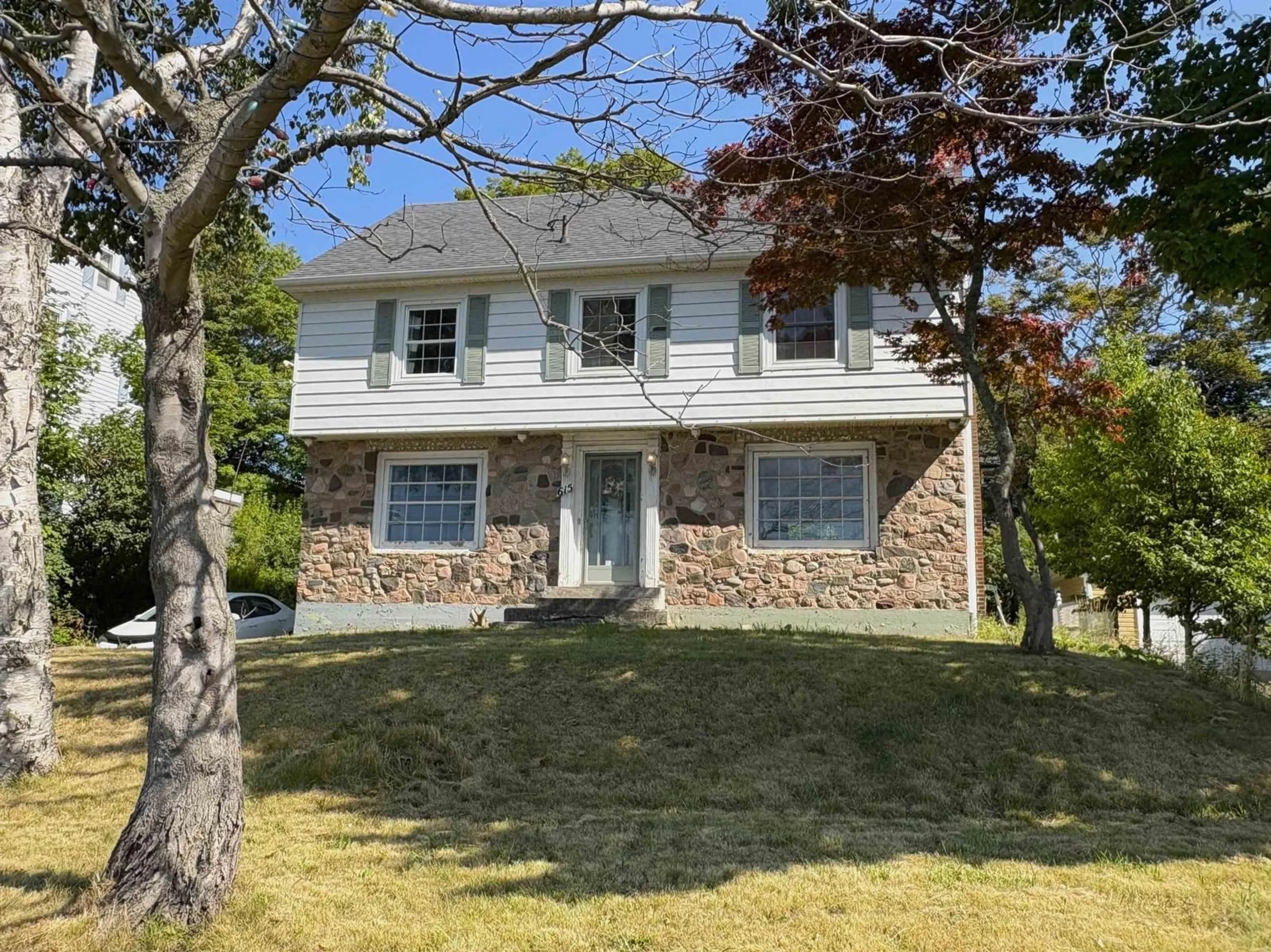 Home with vinyl exterior material, street for 615 Kings Rd, Sydney Nova Scotia B1S 1B8
