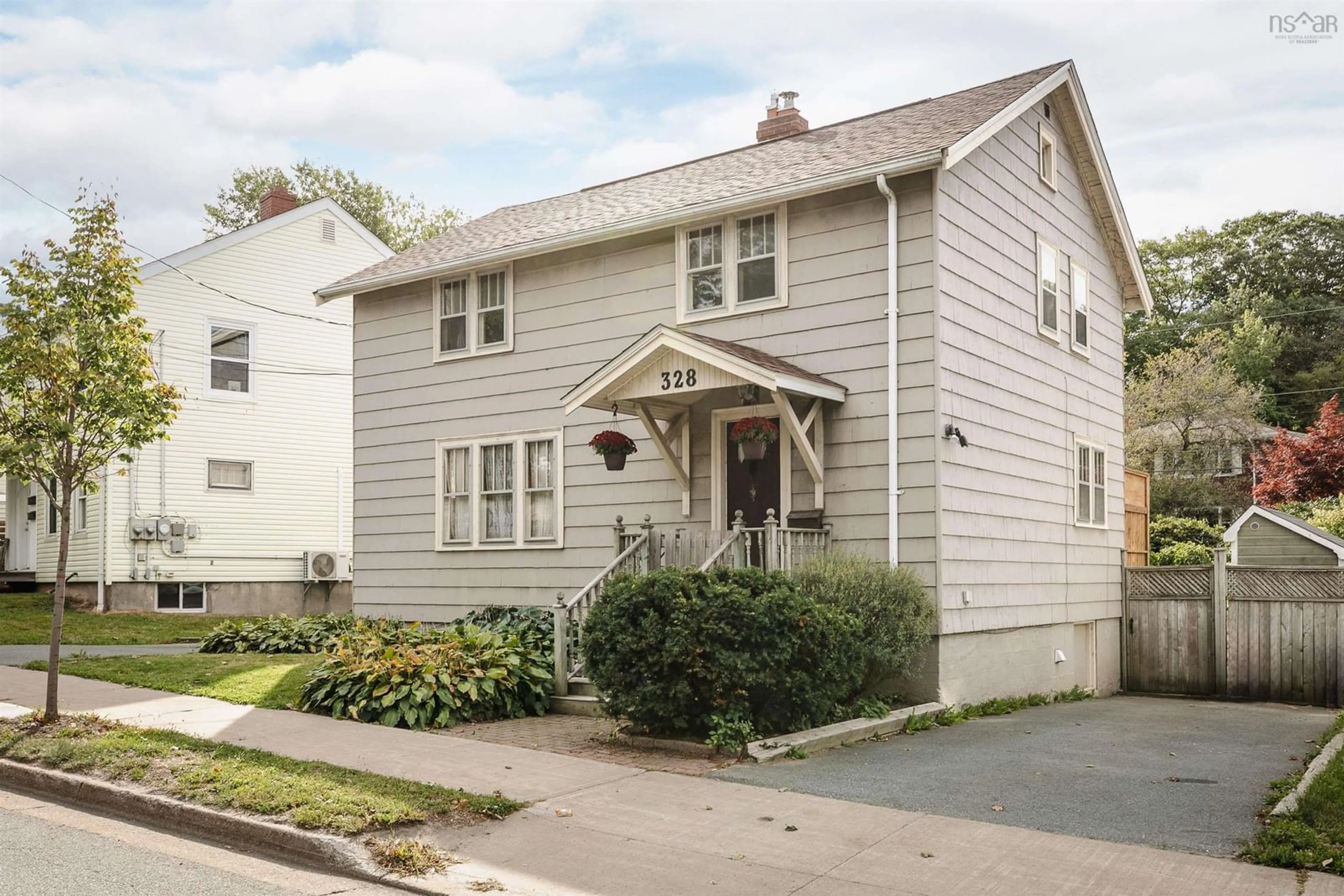 Home with vinyl exterior material, street for 328 Portland St, Dartmouth Nova Scotia B2Y 1K6